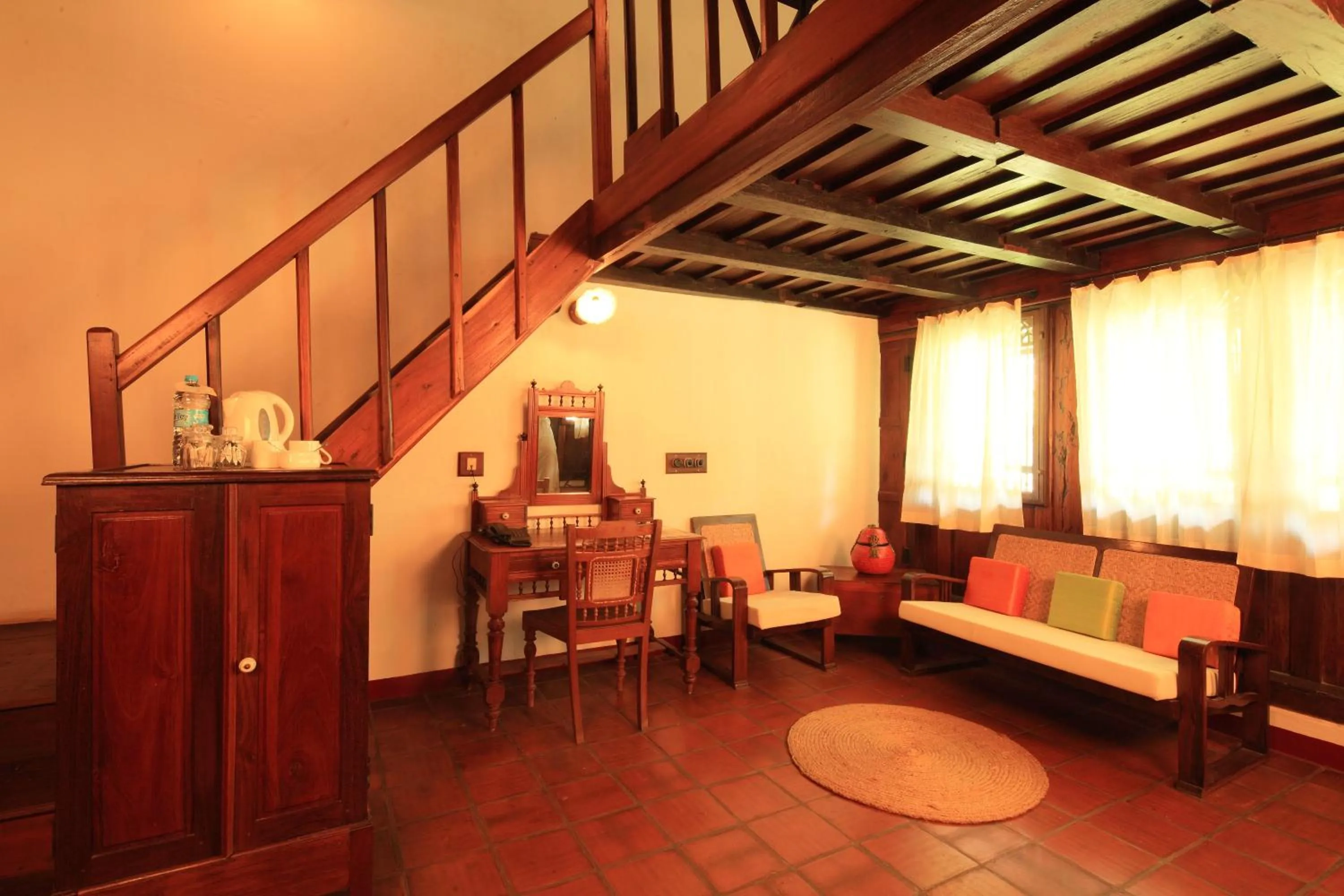 Living room in Coconut Lagoon Kumarakom - A CGH Earth Experience
