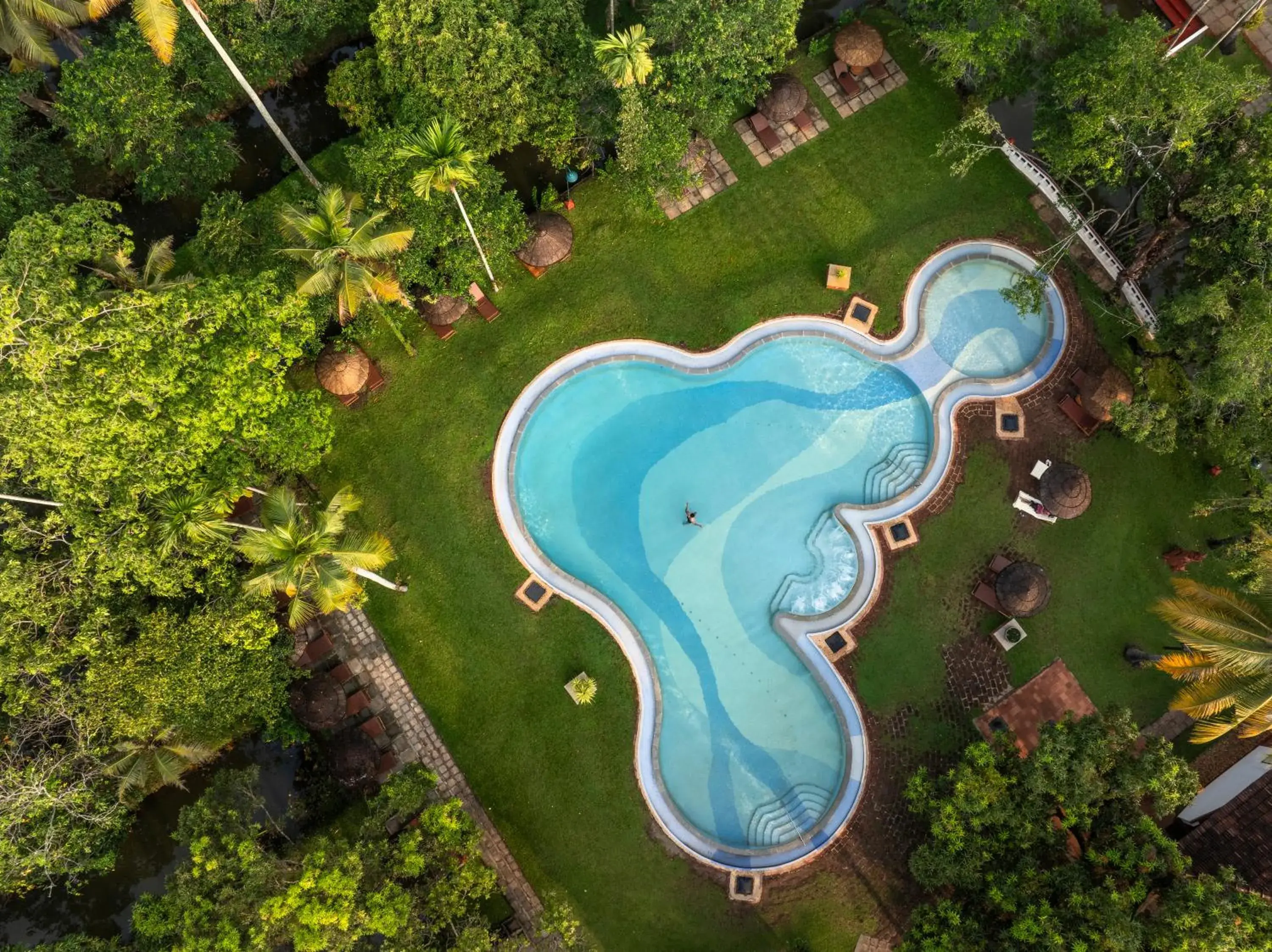 Swimming pool in Coconut Lagoon Kumarakom - A CGH Earth Experience Swimming pool in Coconut Lagoon Kumarakom - A CGH Earth Experience