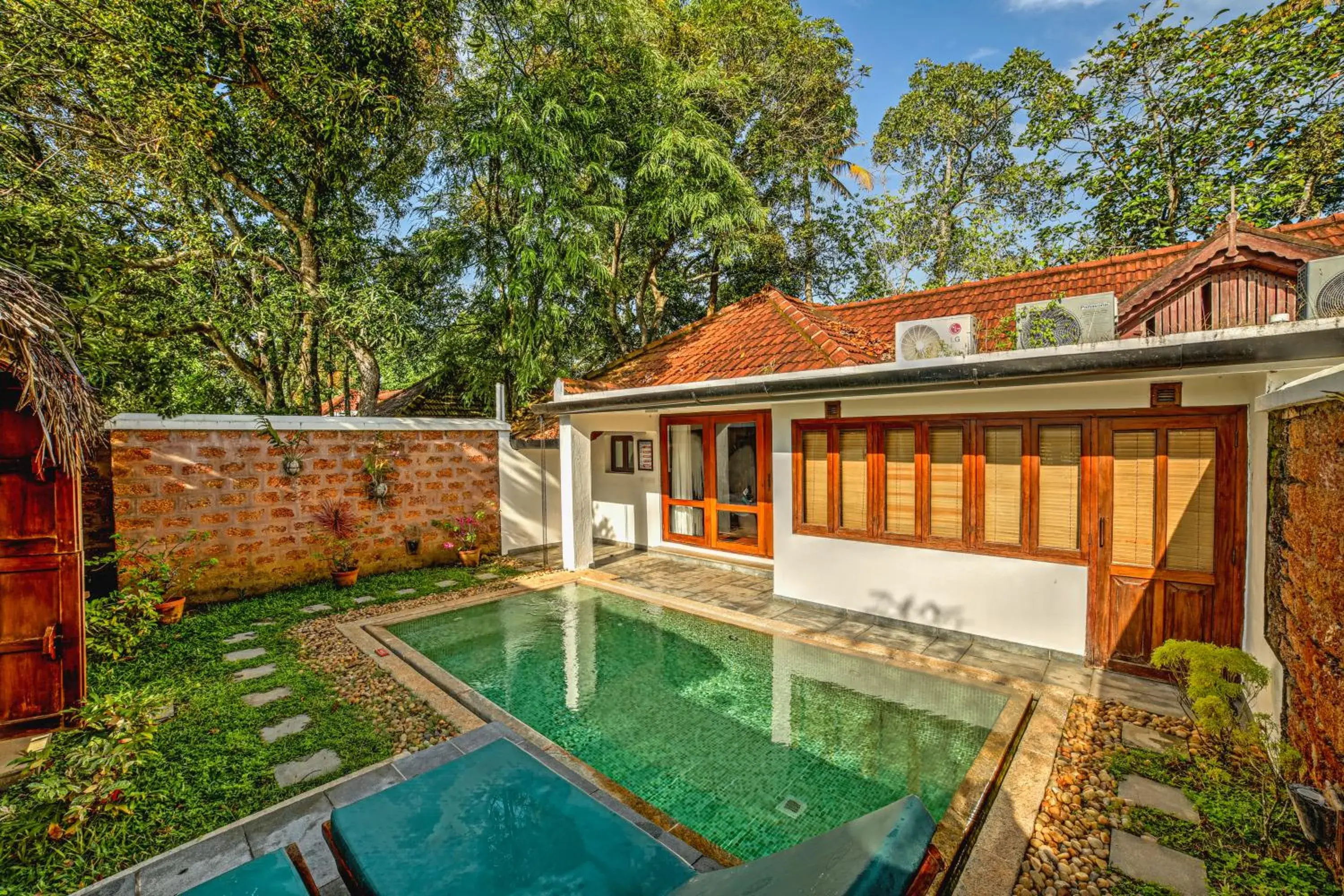 Swimming pool in Coconut Lagoon Kumarakom - A CGH Earth Experience Swimming pool in Coconut Lagoon Kumarakom - A CGH Earth Experience