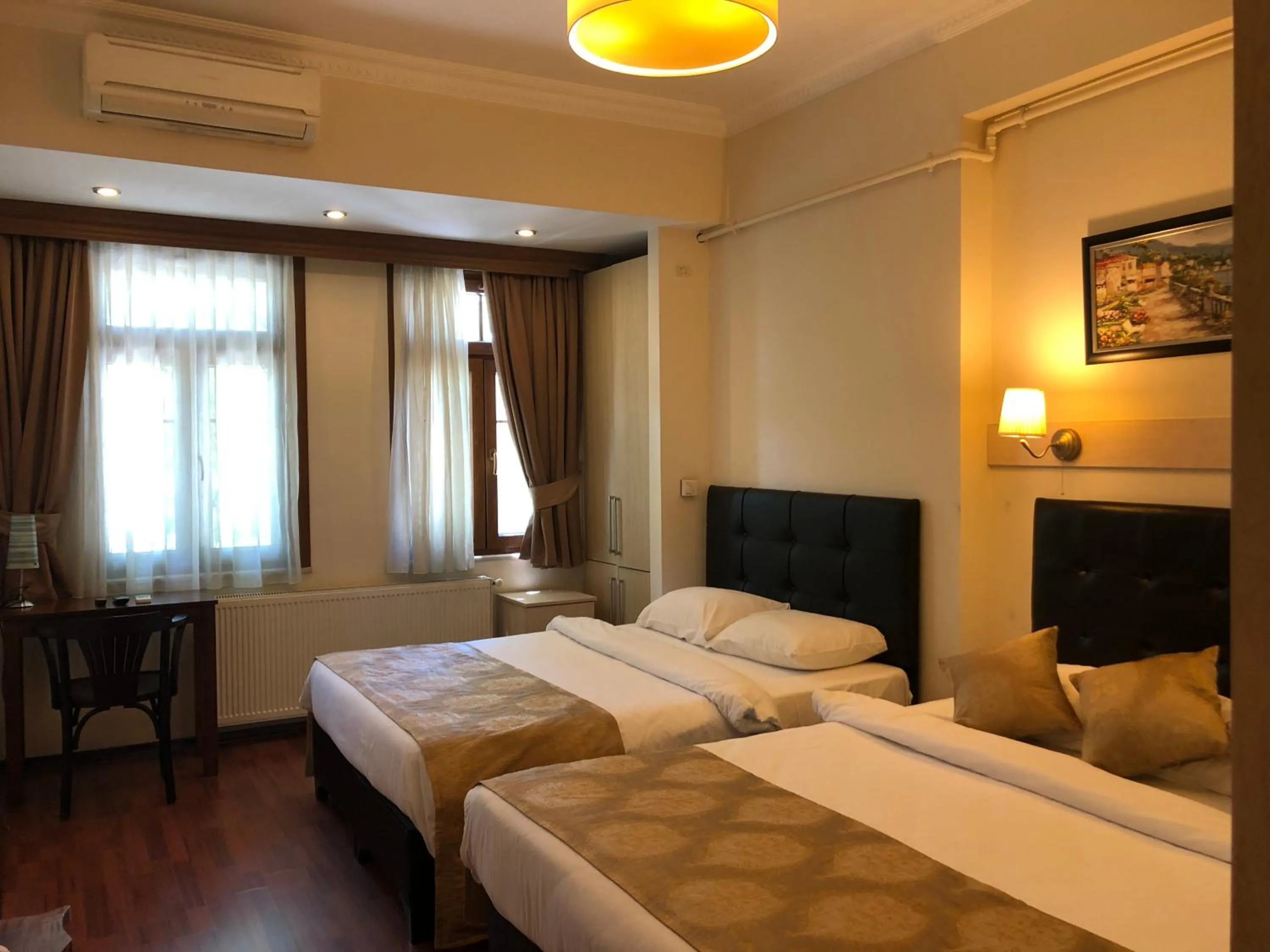 Bed in Taksim House Suites