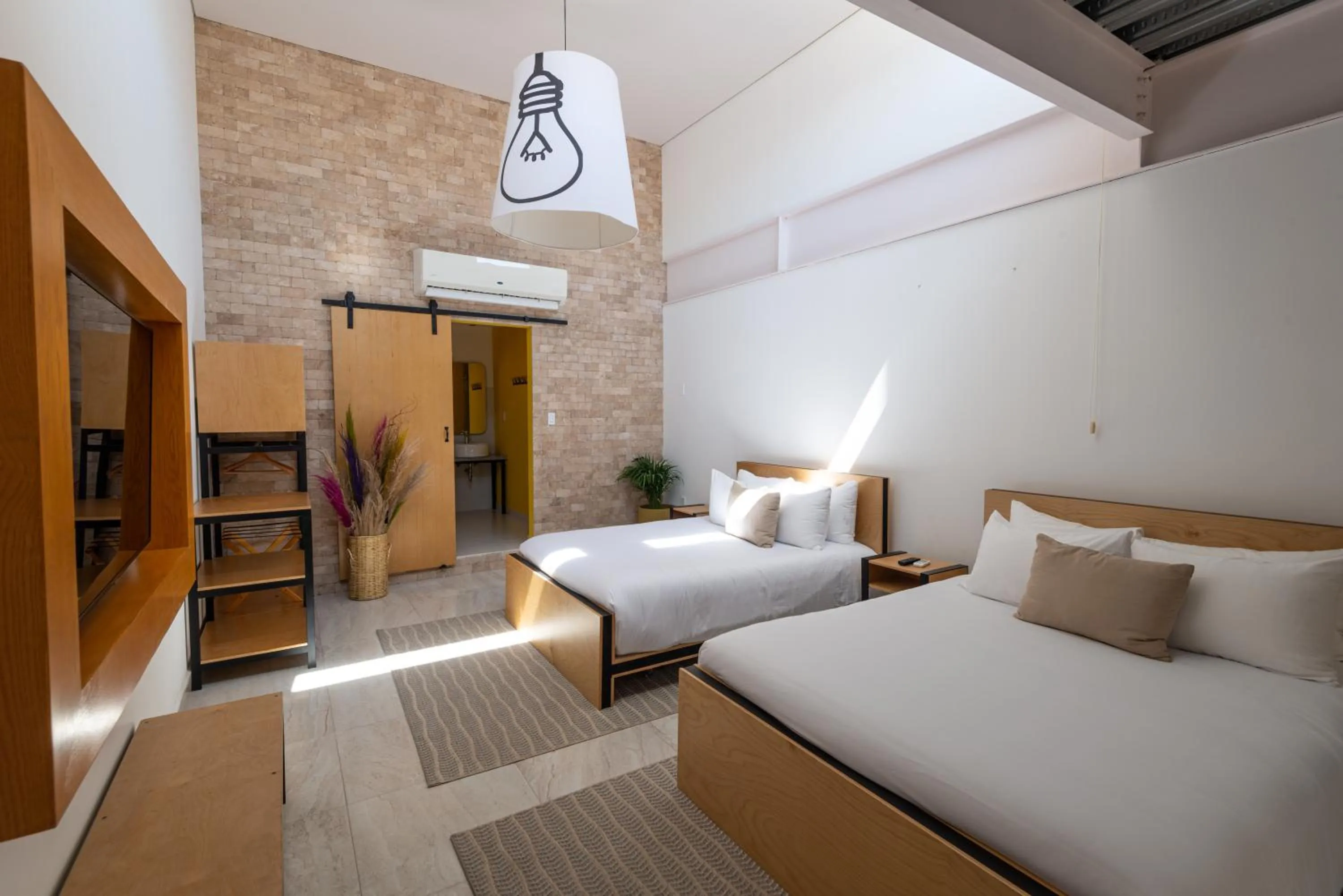 Photo of the whole room, Bed in Mayan Monkey Los Cabos - Social Hotel