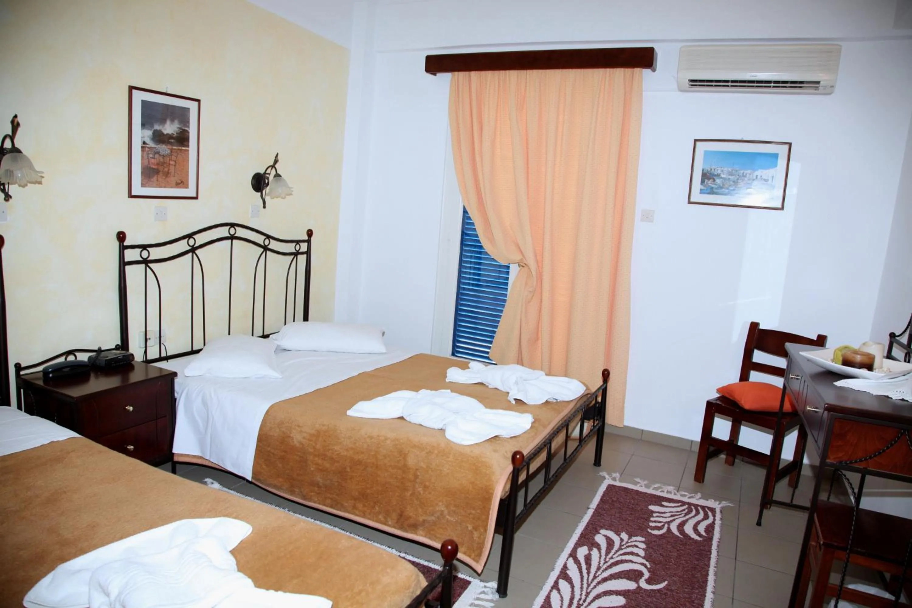 Bed in Nikolas Hotel