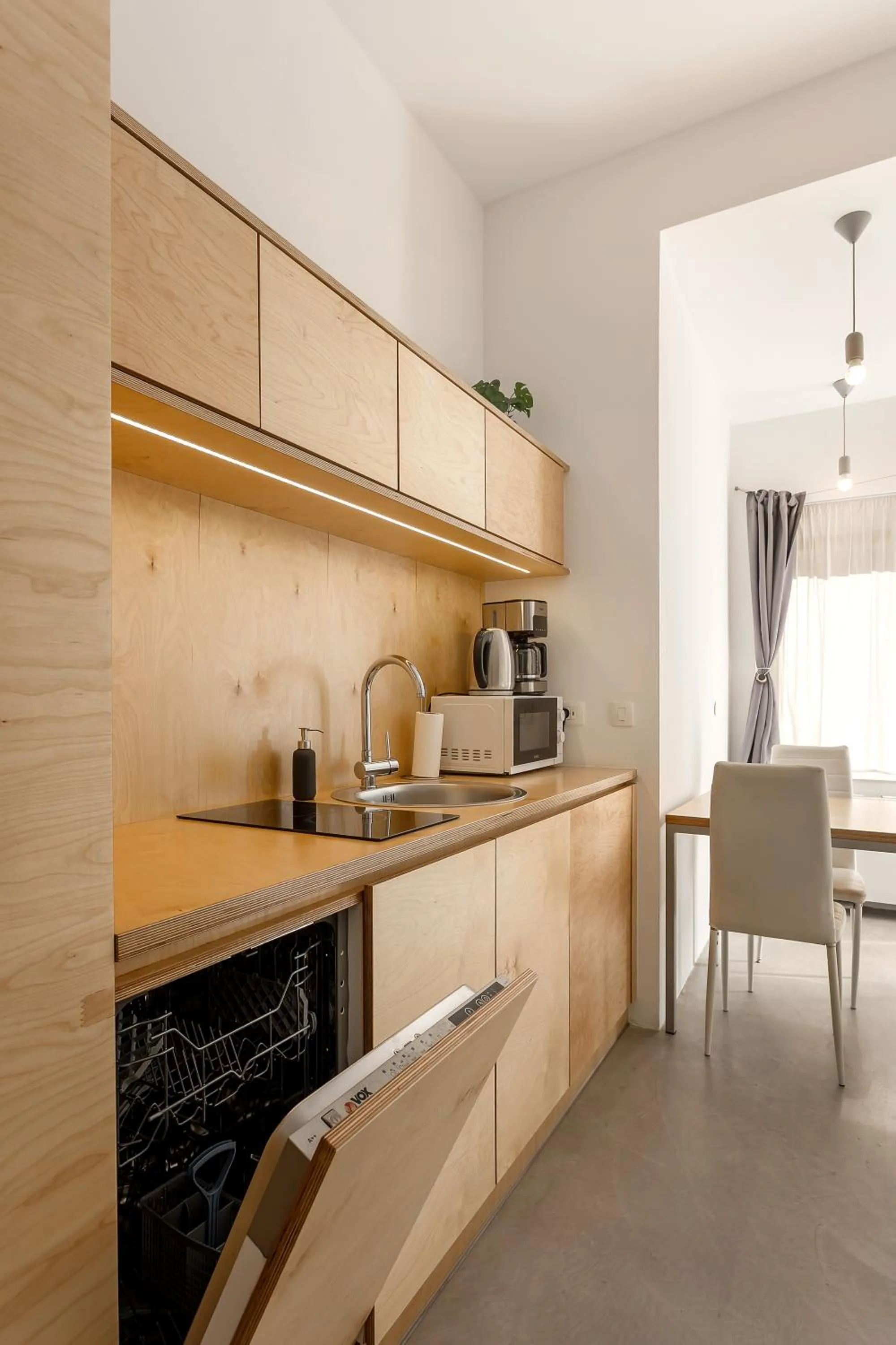 Kitchen or kitchenette in Pekarna apartments