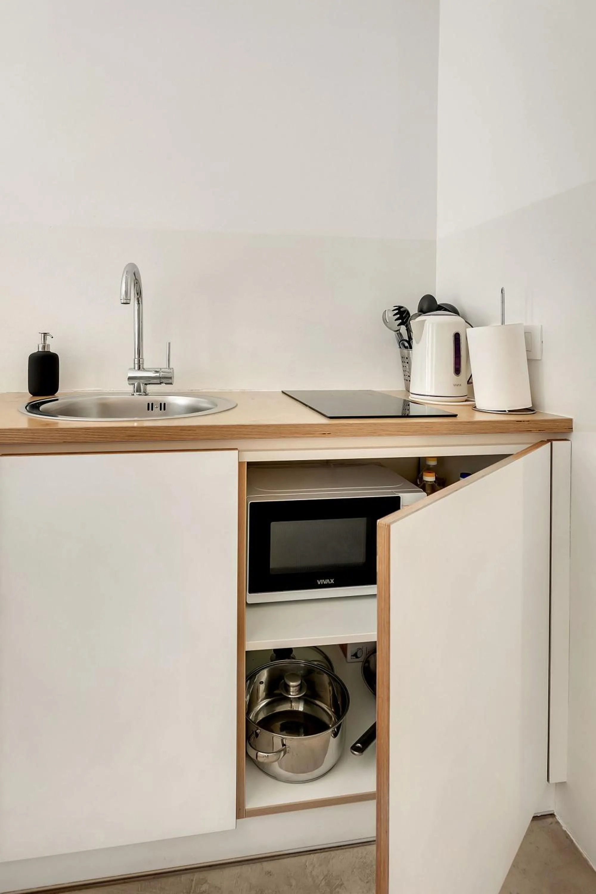 Kitchen or kitchenette in Pekarna apartments