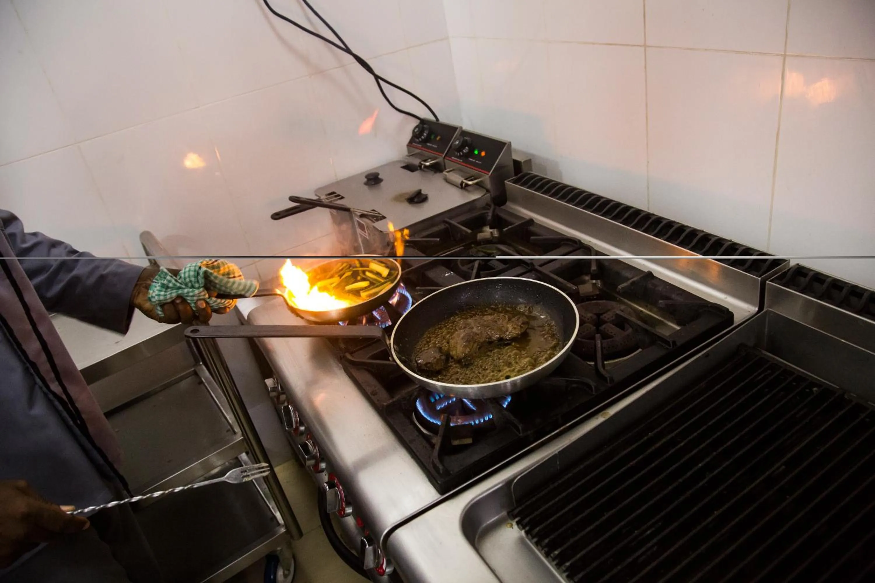 Kitchen or kitchenette in Spice Palace Hotel