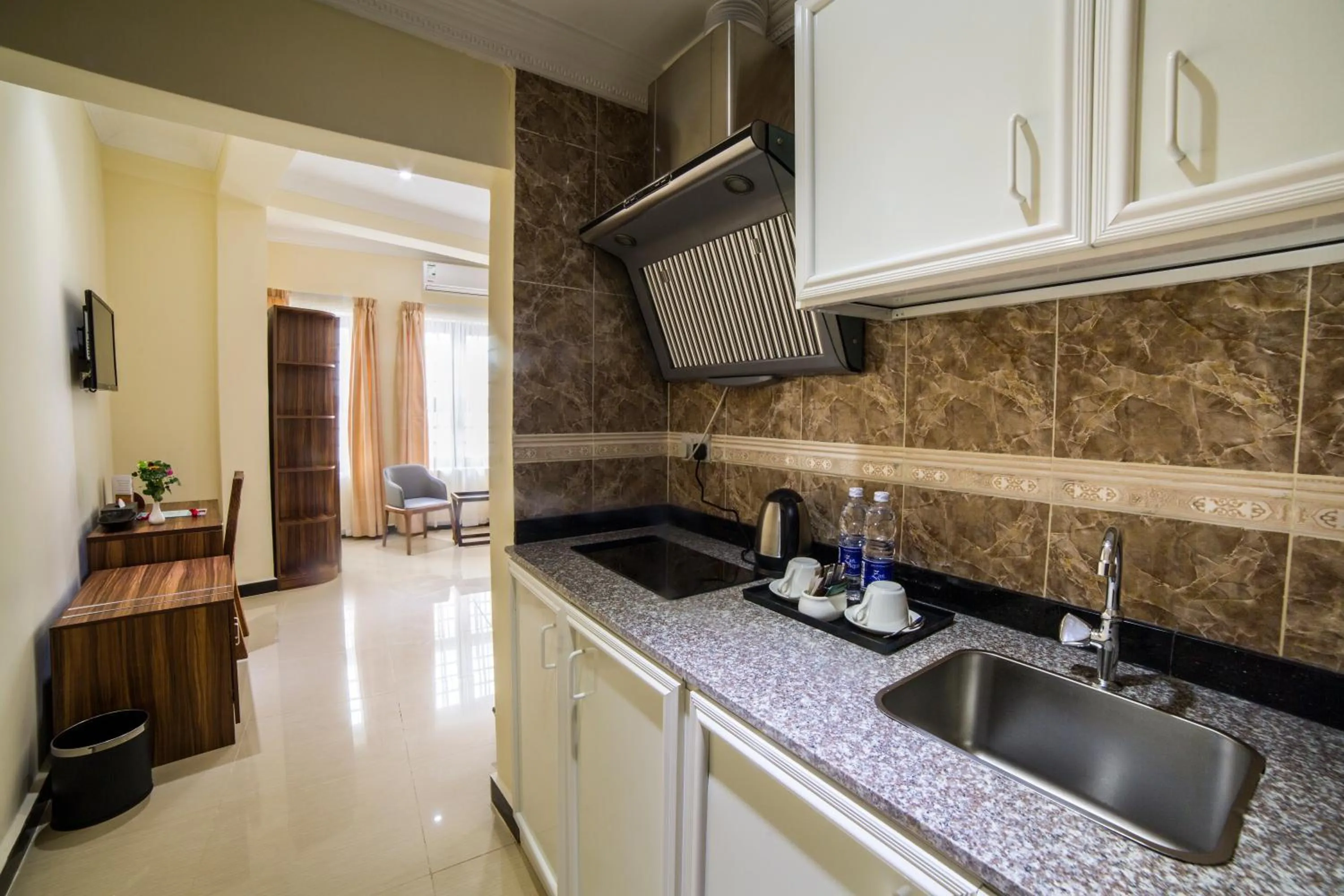Kitchen or kitchenette in Spice Palace Hotel