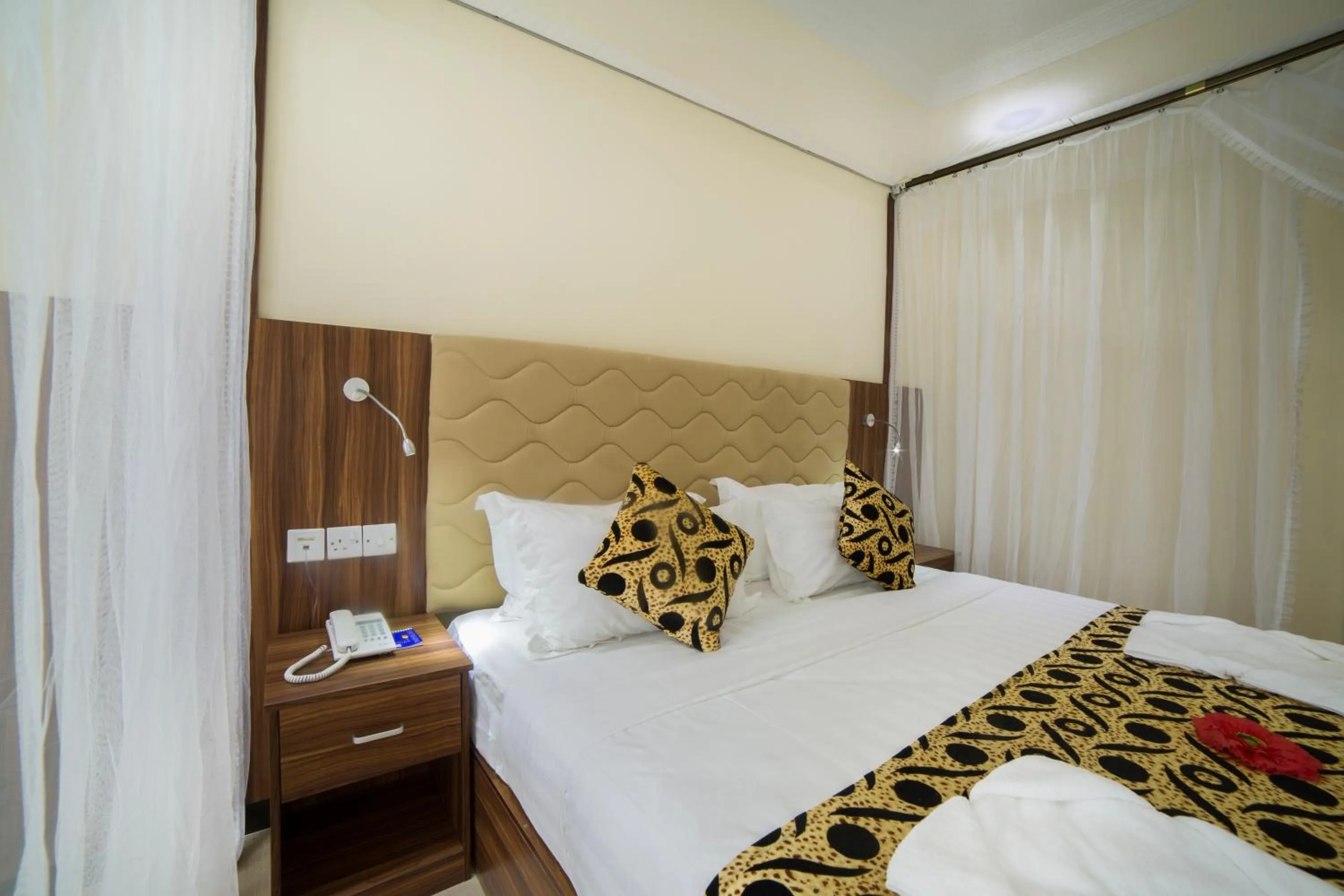 Bed in Spice Palace Hotel