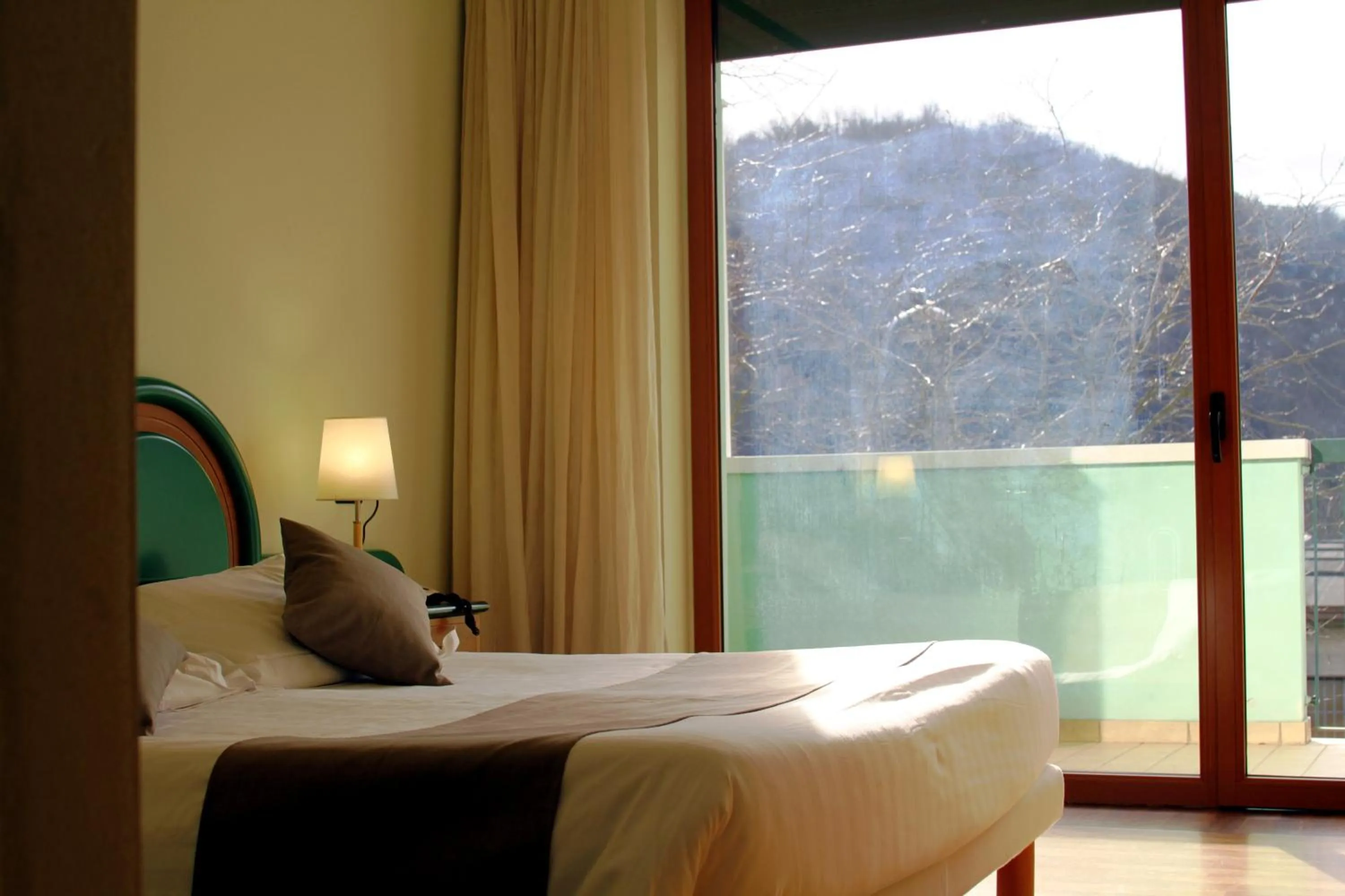 Balcony/Terrace, Bed in La Fonte Hotel