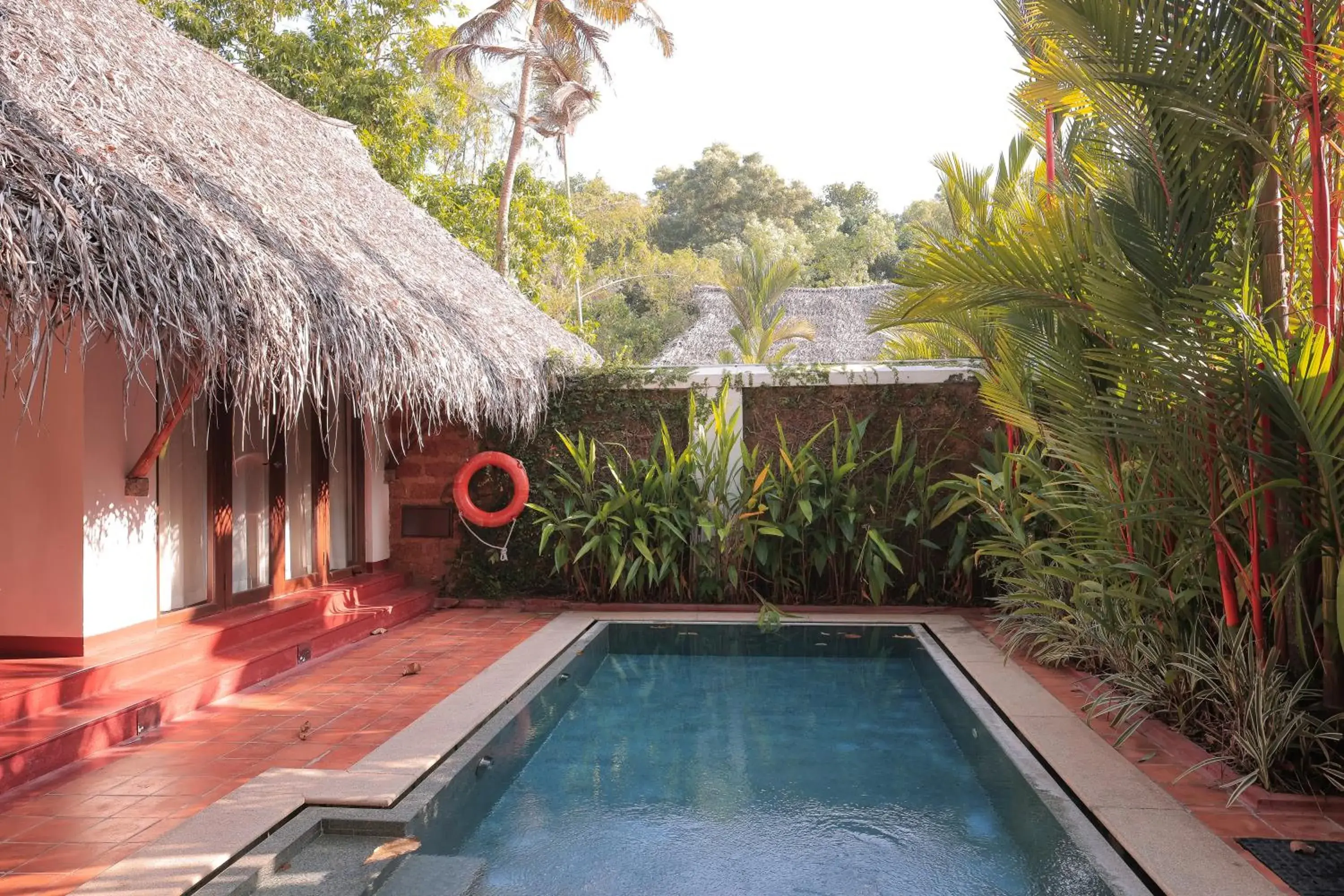 Pool view in Marari Beach Resort Alleppey - A CGH Earth Experience Pool view in Marari Beach Resort Alleppey - A CGH Earth Experience