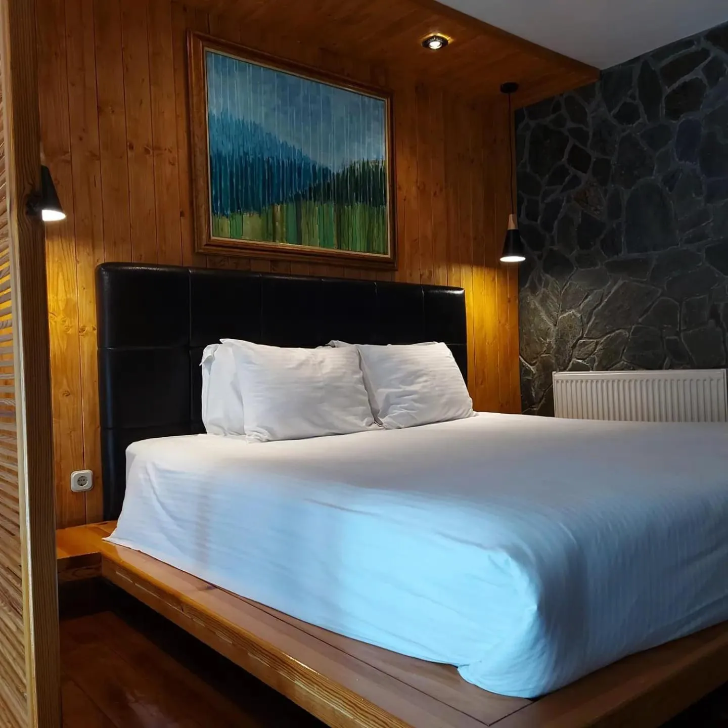 Bed in Aurora Resort & Spa
