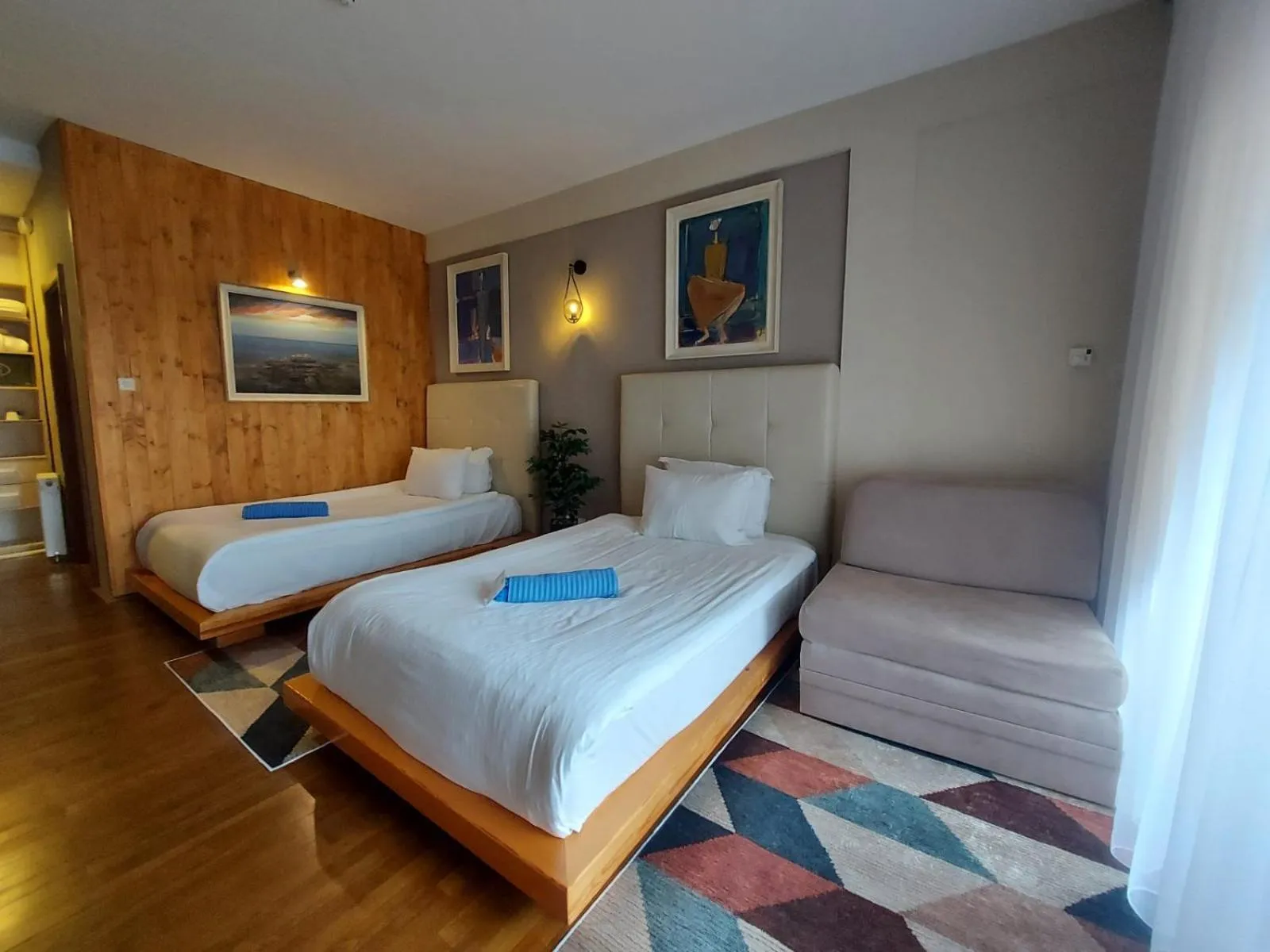 Bed in Aurora Resort & Spa