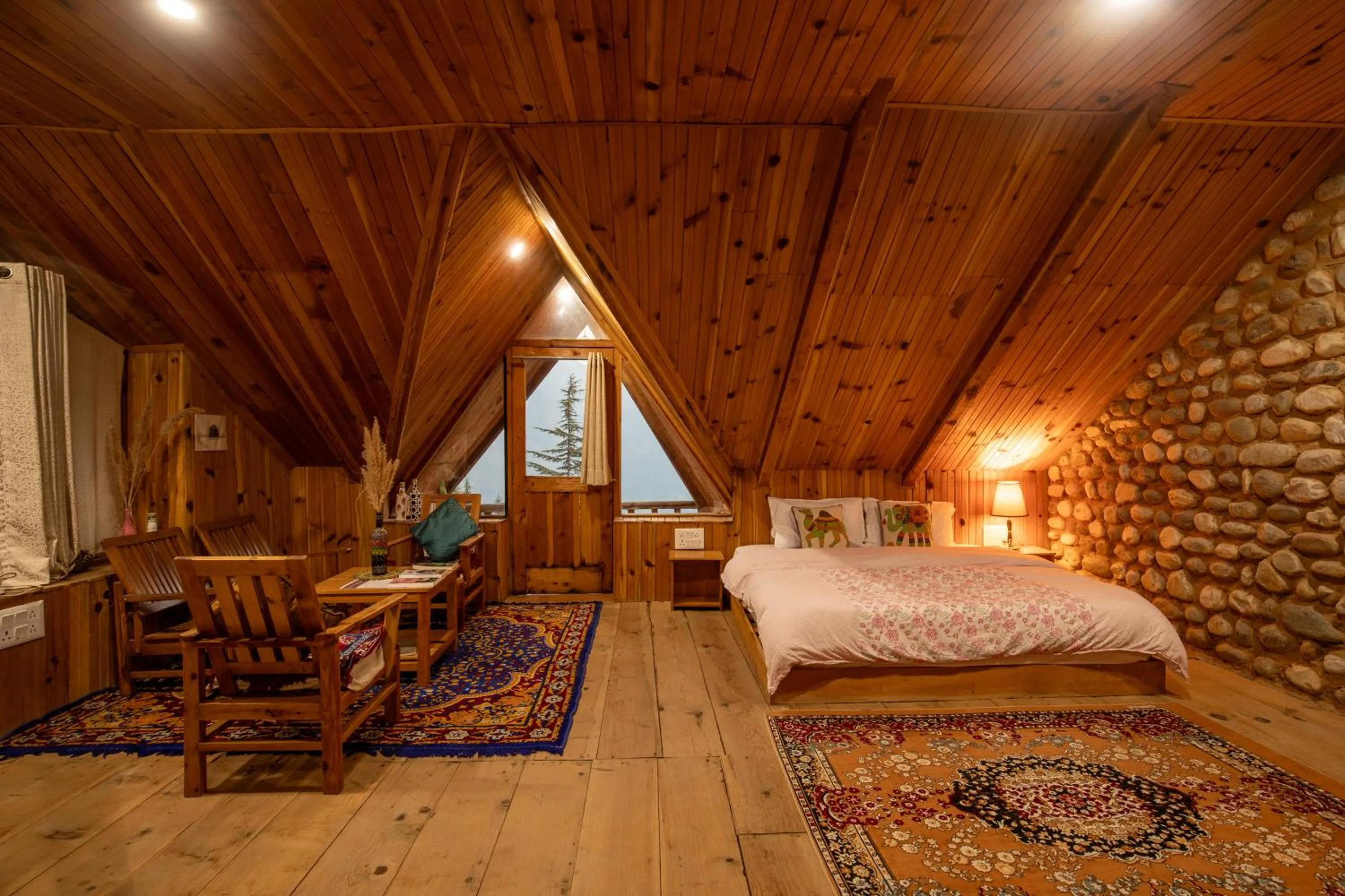 Bed in Ishan Log Huts-A boutique home stay