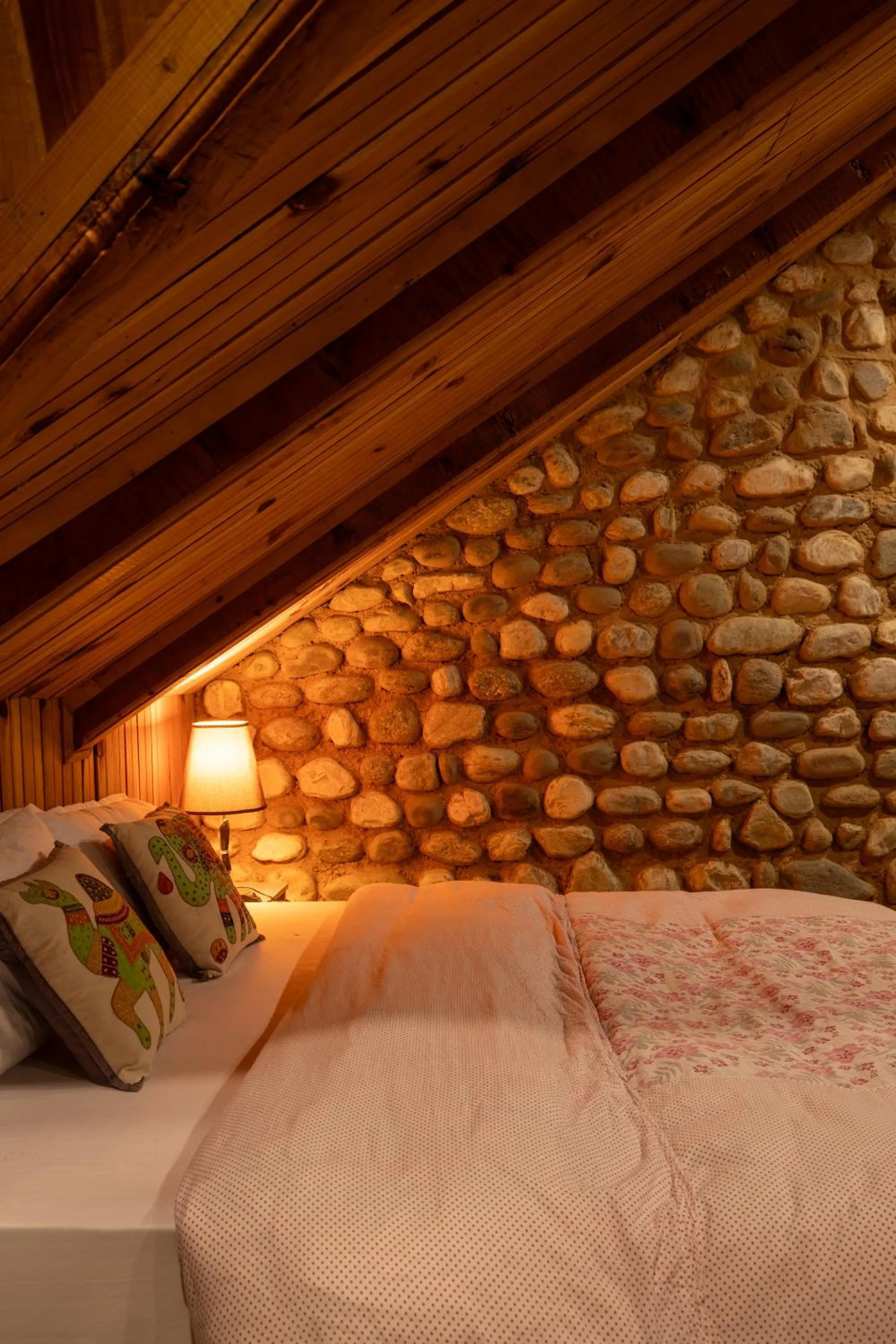 Bed in Ishan Log Huts-A boutique home stay