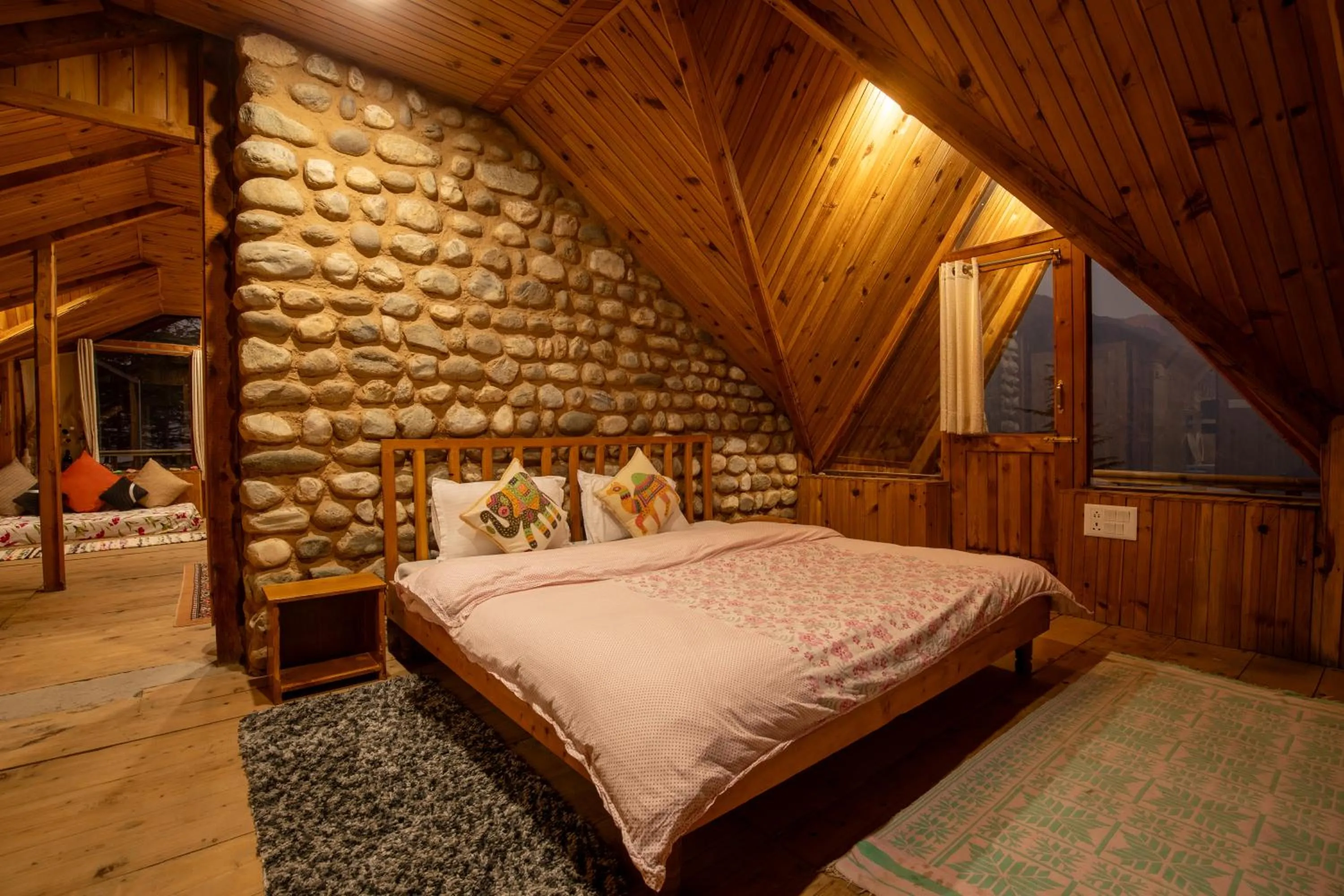 Bed in Ishan Log Huts-A boutique home stay