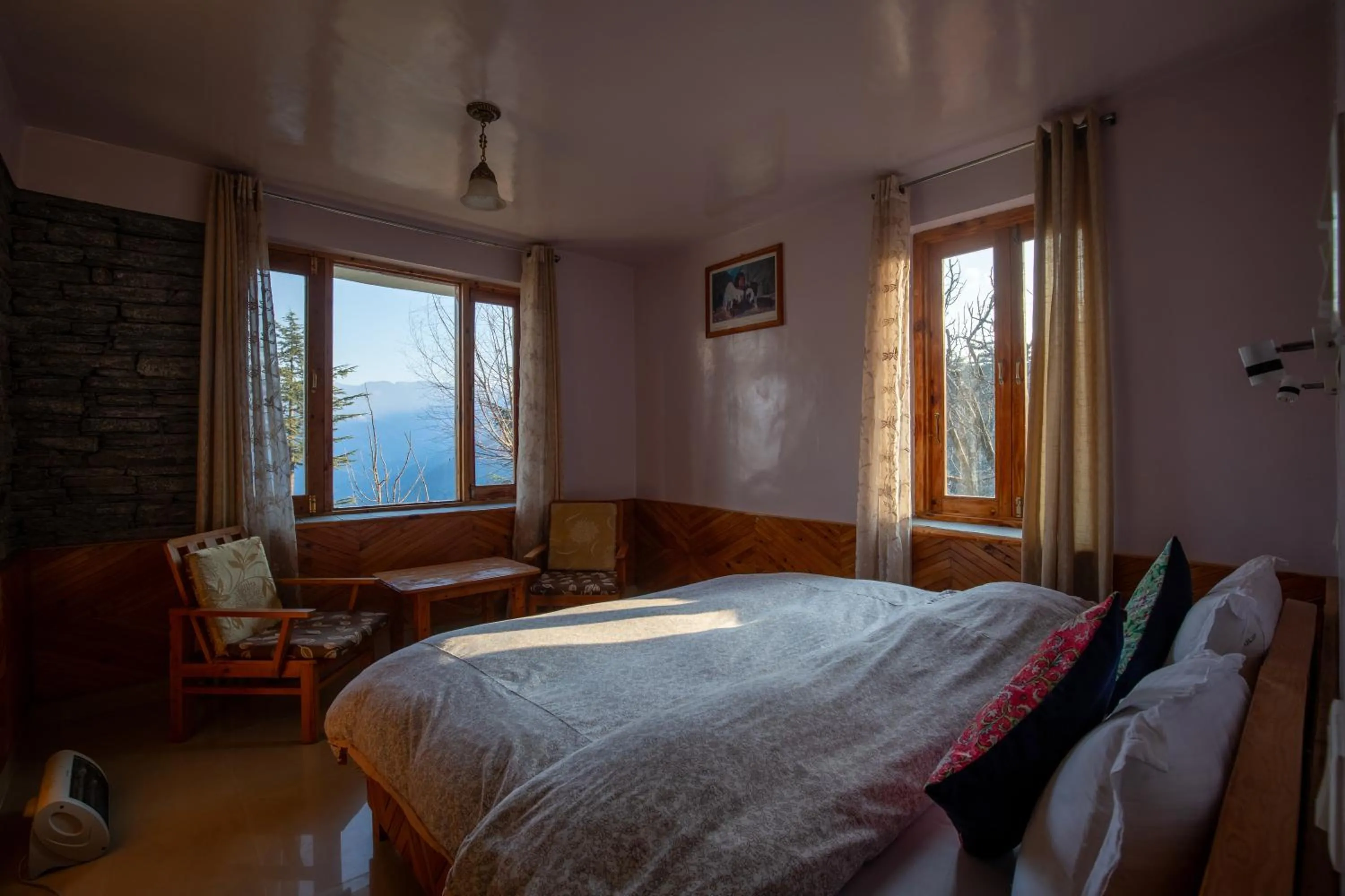 Bed in Ishan Log Huts-A boutique home stay