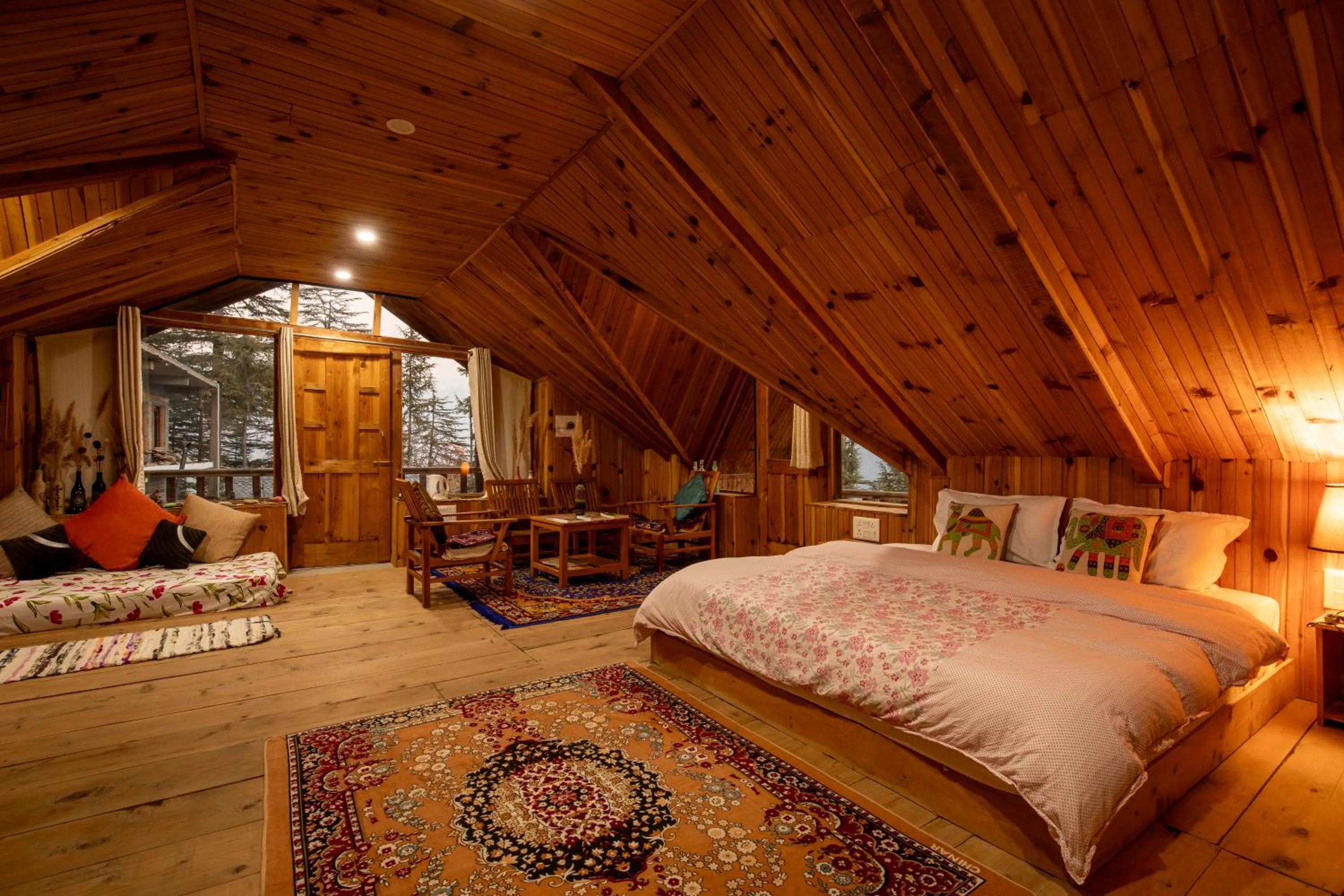 Bed in Ishan Log Huts-A boutique home stay
