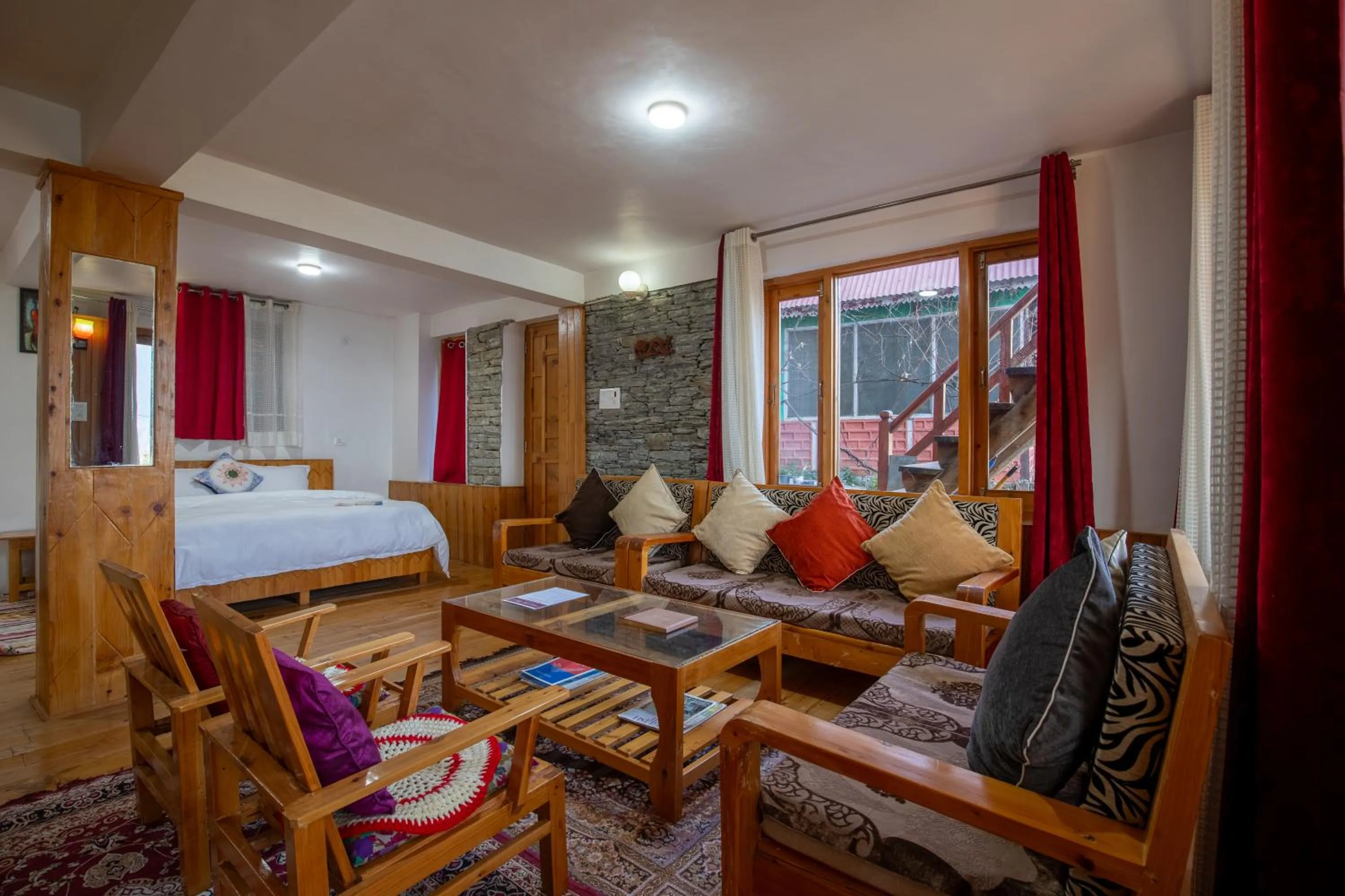 Bed in Ishan Log Huts-A boutique home stay