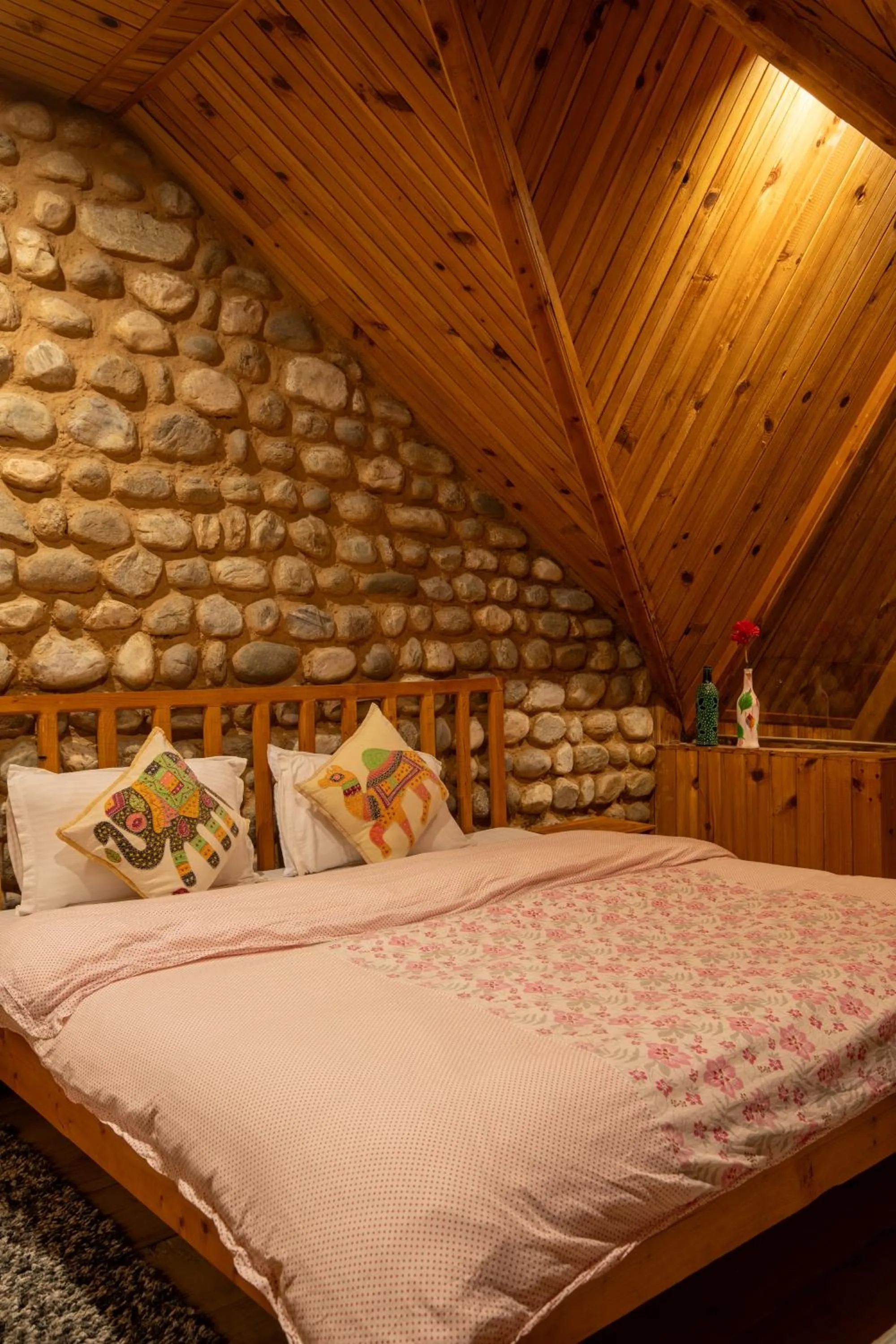 Bed in Ishan Log Huts-A boutique home stay