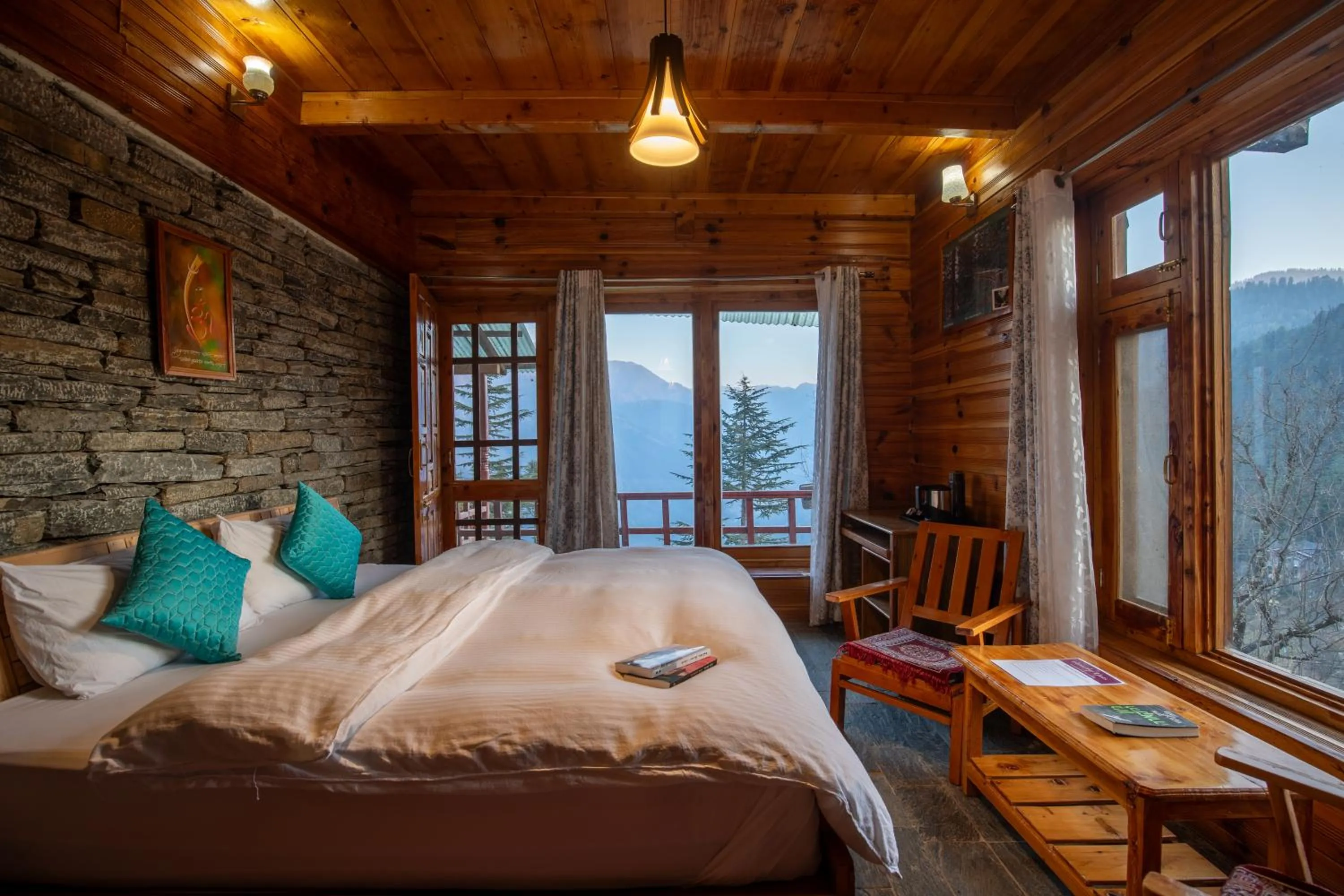 Bed in Ishan Log Huts-A boutique home stay