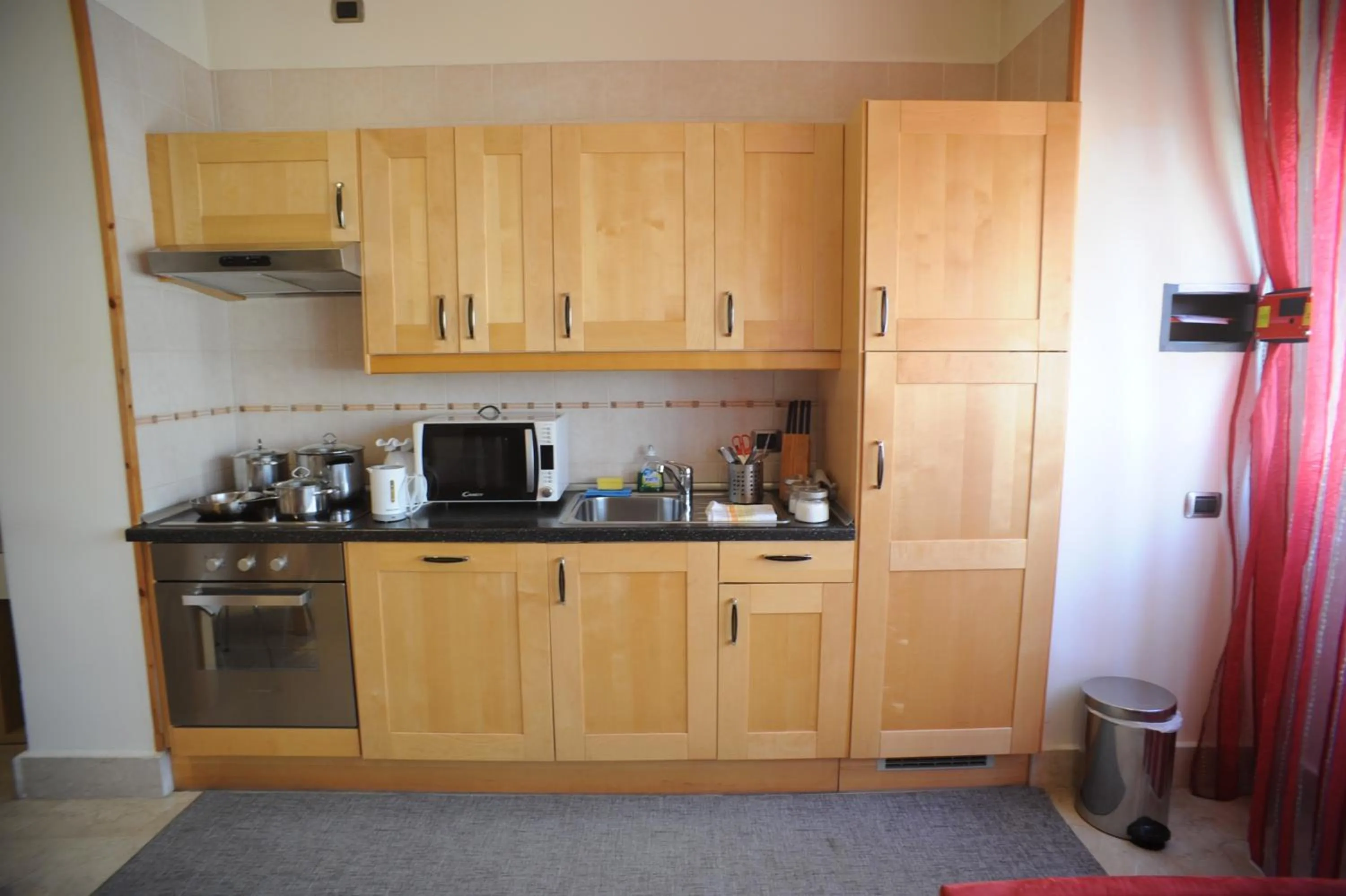 Kitchen or kitchenette in Lux Appartamenti