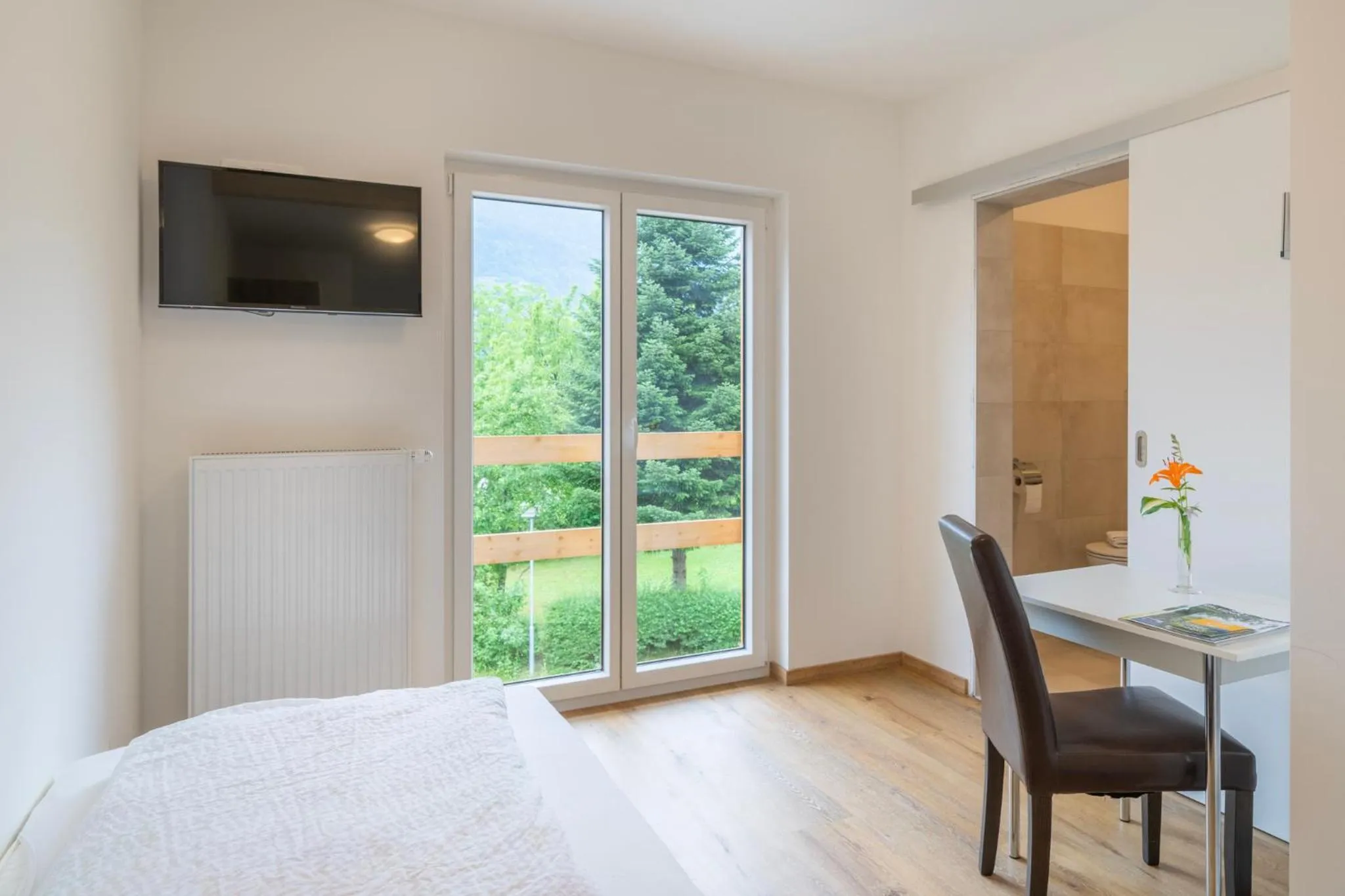 TV and multimedia, Bed in Wellness Landhaus Parth