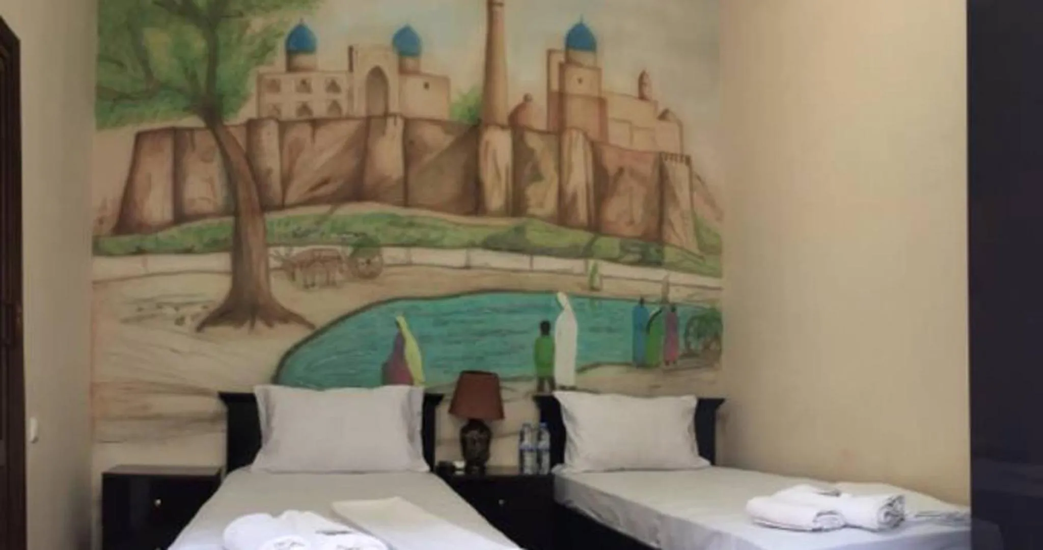 Property building, Bed in Habibi Bukhara