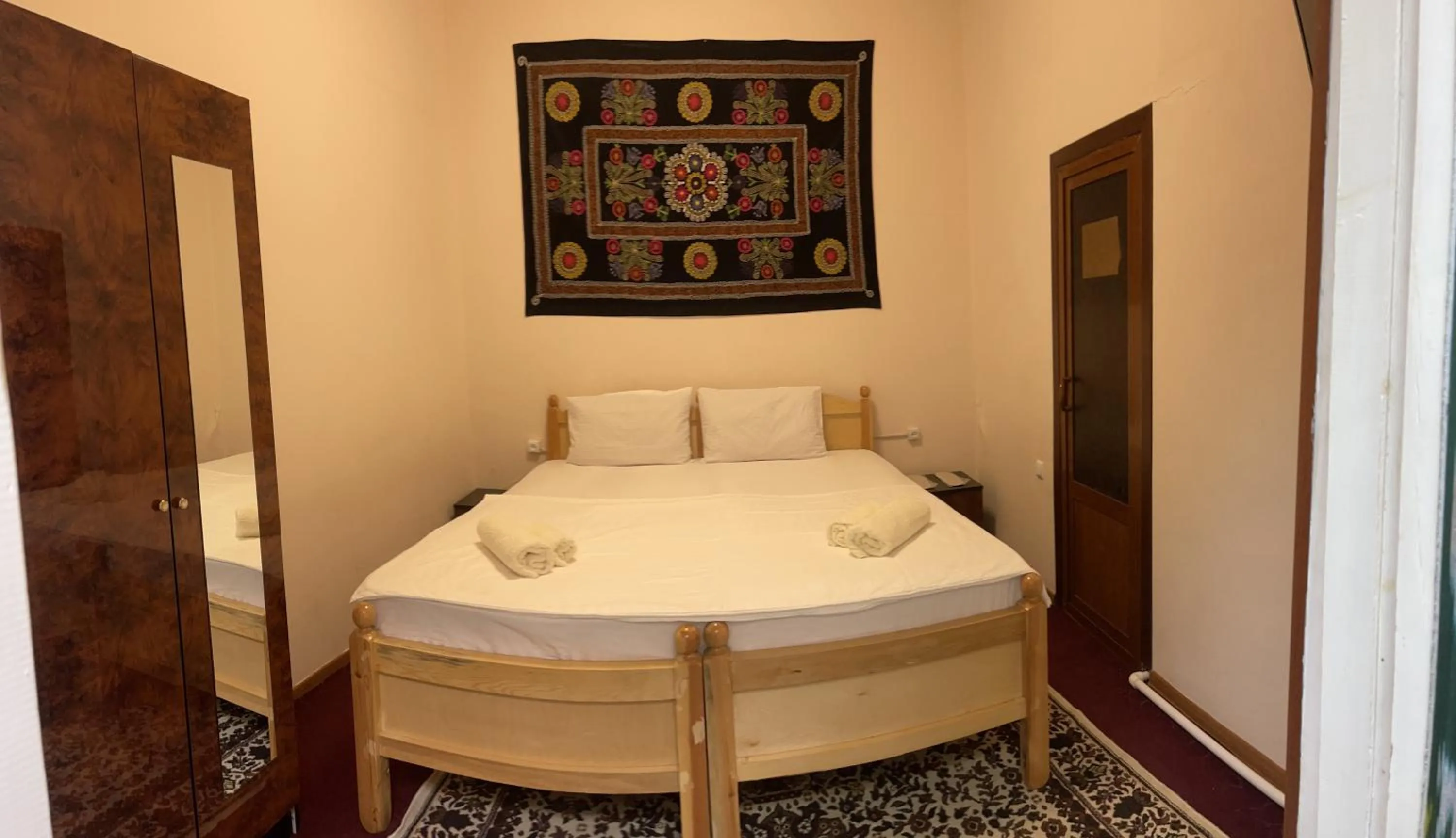 Bed in Habibi Bukhara