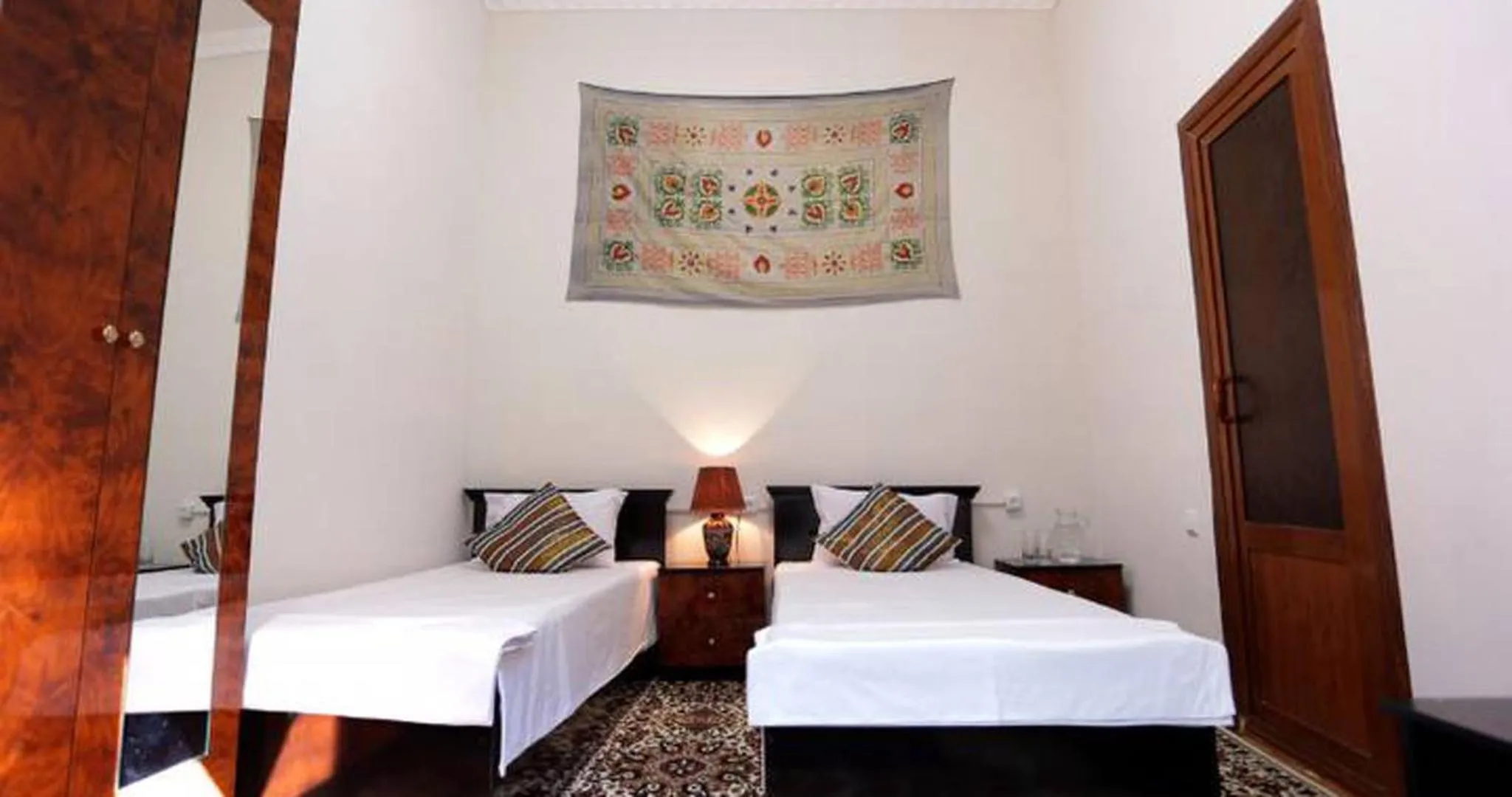 Property building, Bed in Habibi Bukhara