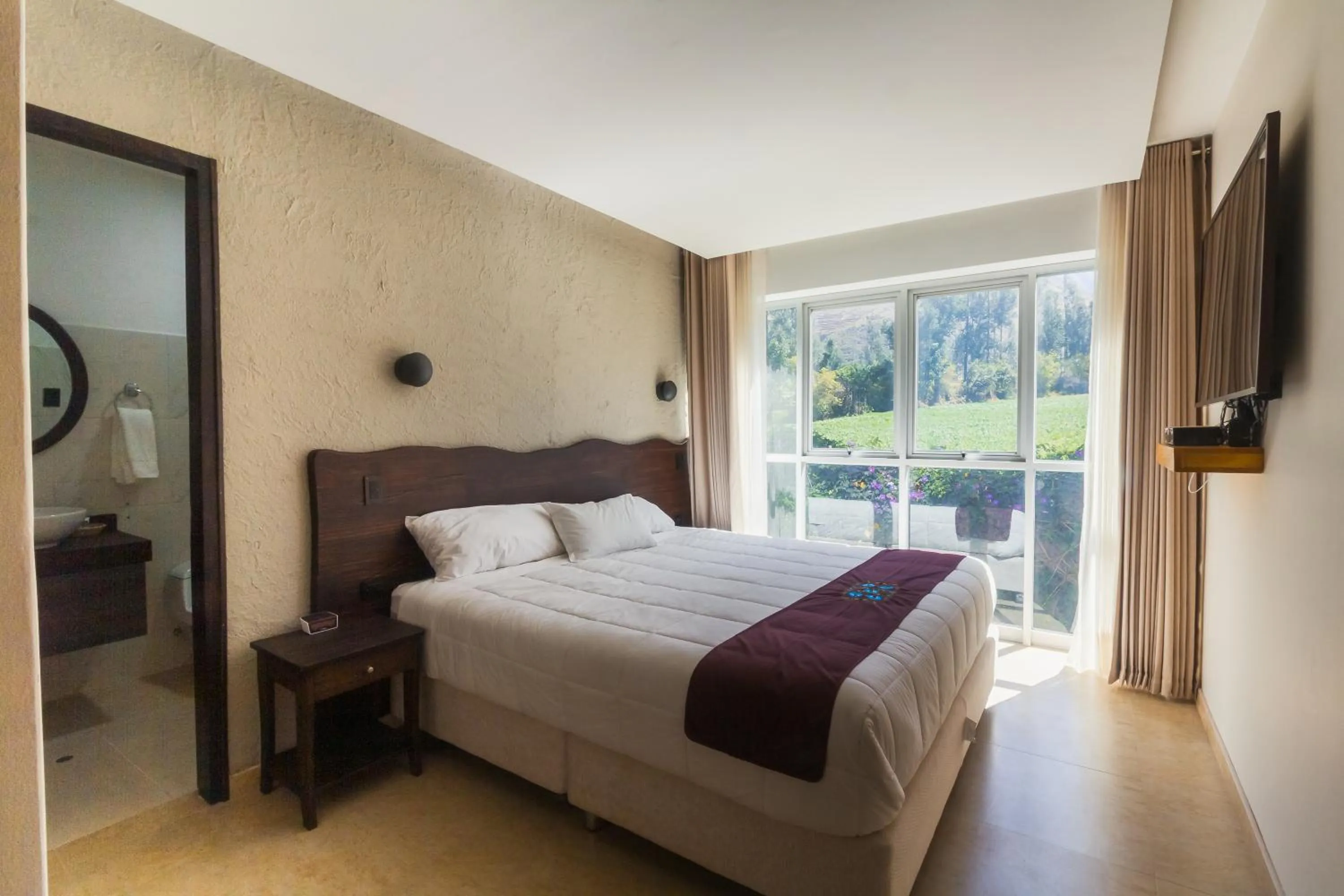 Master Suite with Balcony and Garden View - single occupancy in Hacienda del Valle Sagrado