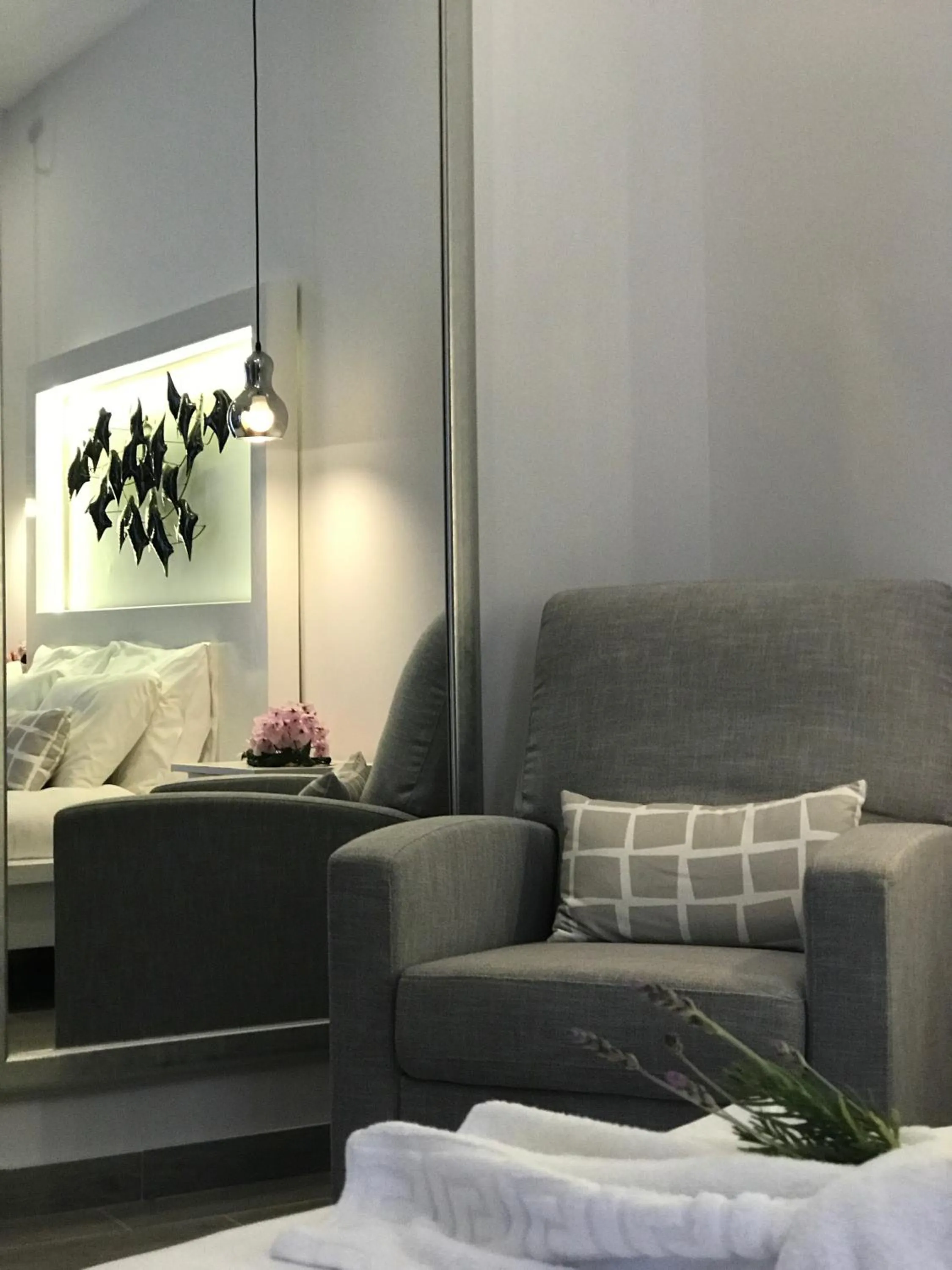 Seating area in IONIAN SUITES by Bruskos