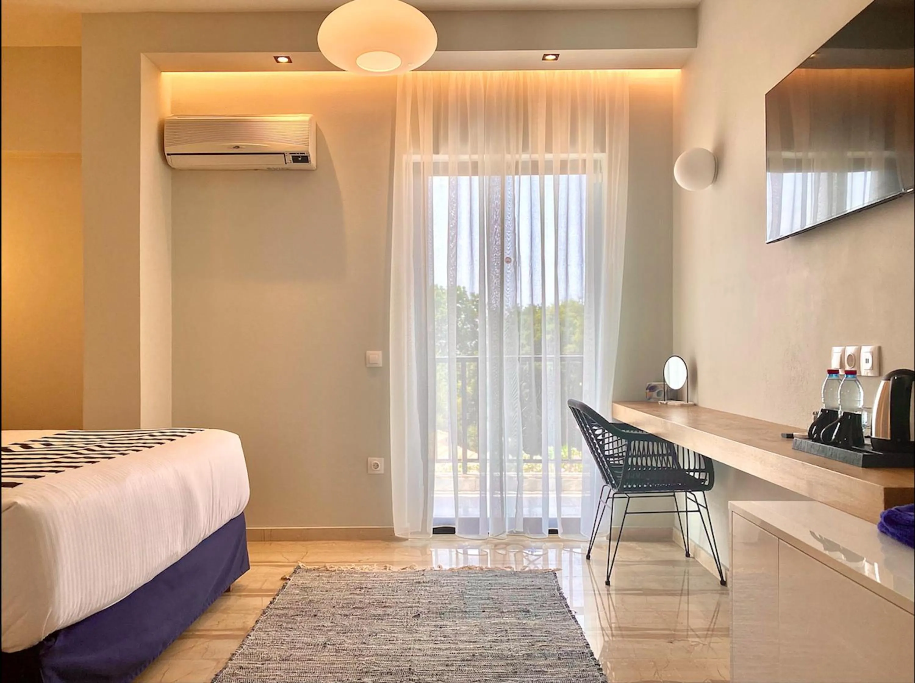 Photo of the whole room in IONIAN SUITES by Bruskos