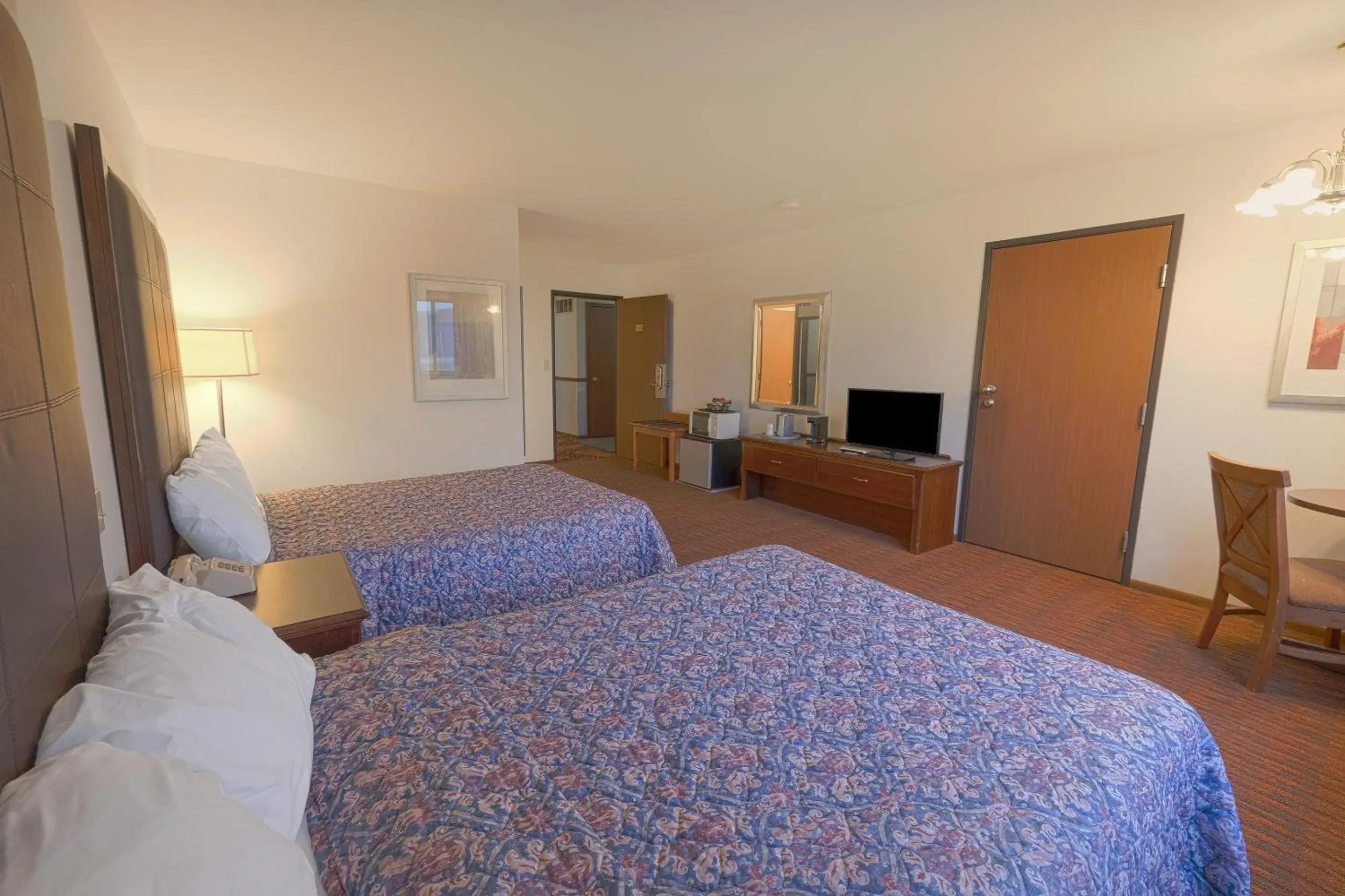 Bedroom, Bed in Harlan Inn and Suites By OYO Harlan Bedroom, Bed in Harlan Inn and Suites By OYO Harlan