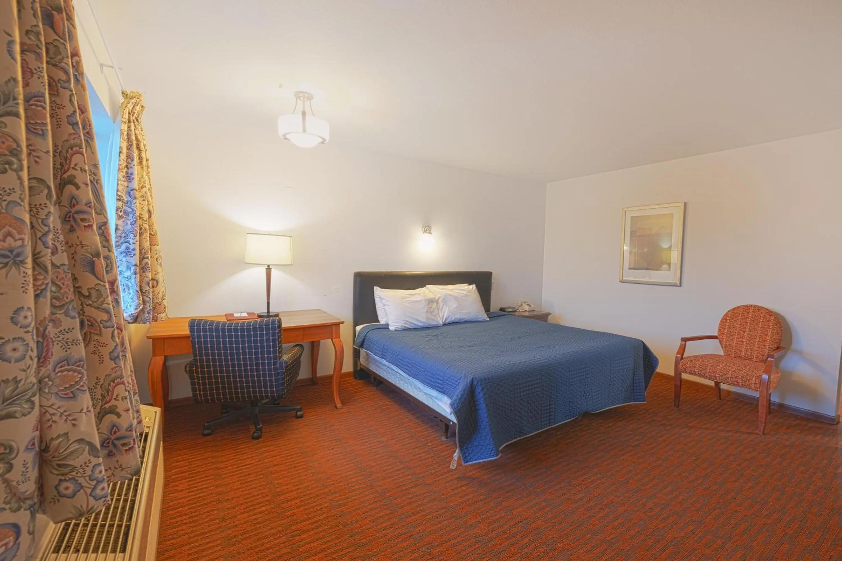 Bedroom, Bed in Harlan Inn and Suites By OYO Harlan