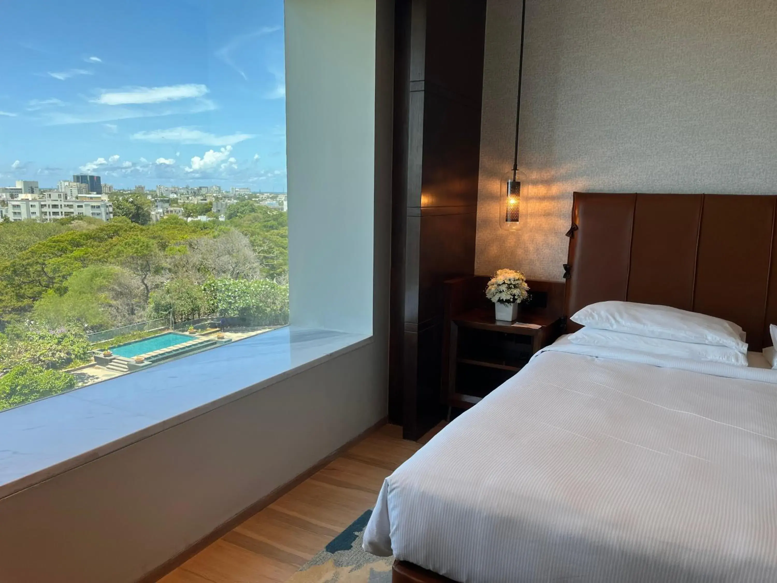 Pool view, Bed in Hyatt Regency Chennai Pool view, Bed in Hyatt Regency Chennai