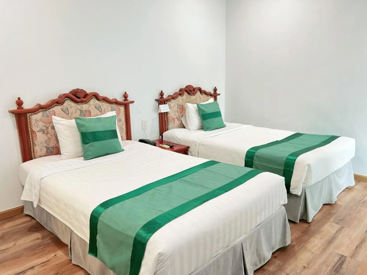 Bed in Riverside Hotel Saigon