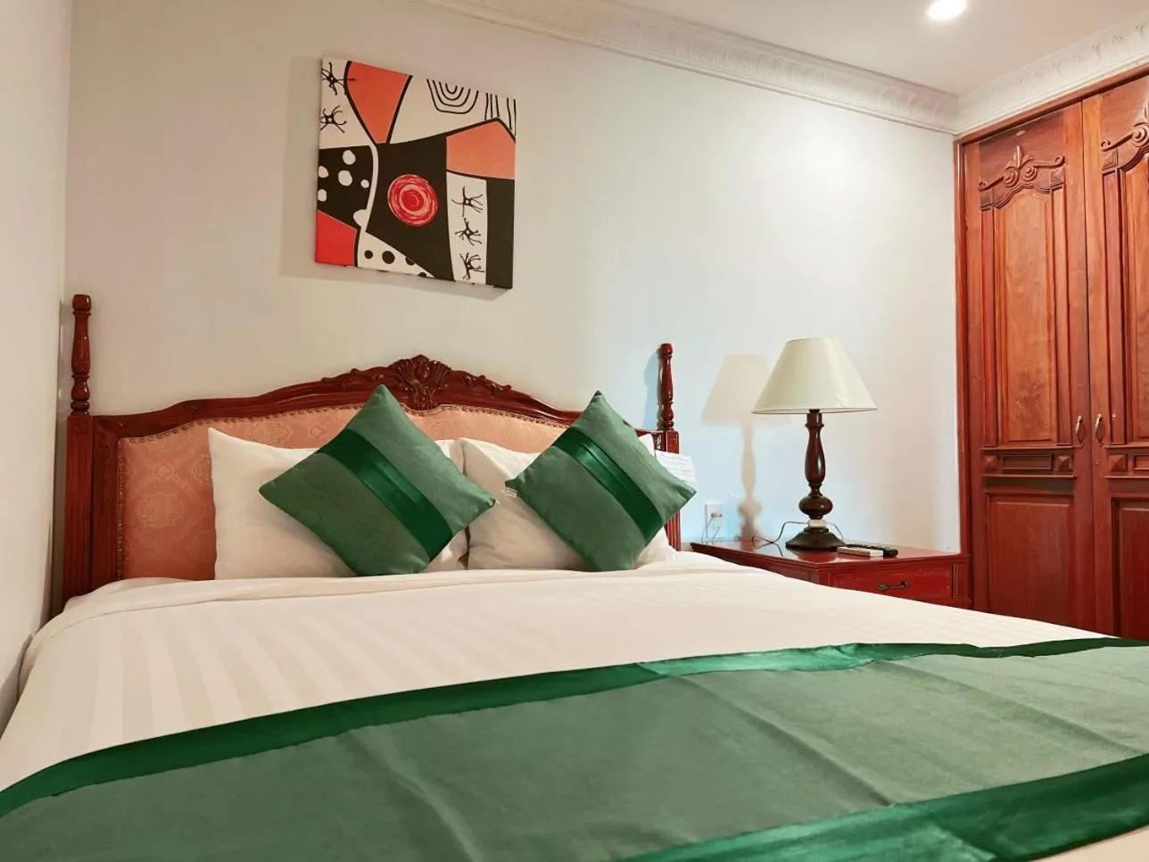 Bed in Riverside Hotel Saigon