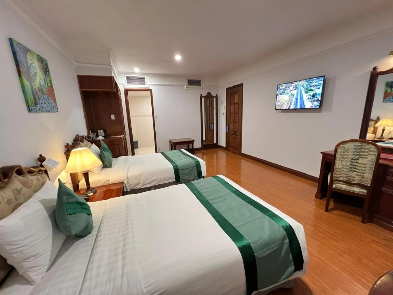 Bed in Riverside Hotel Saigon