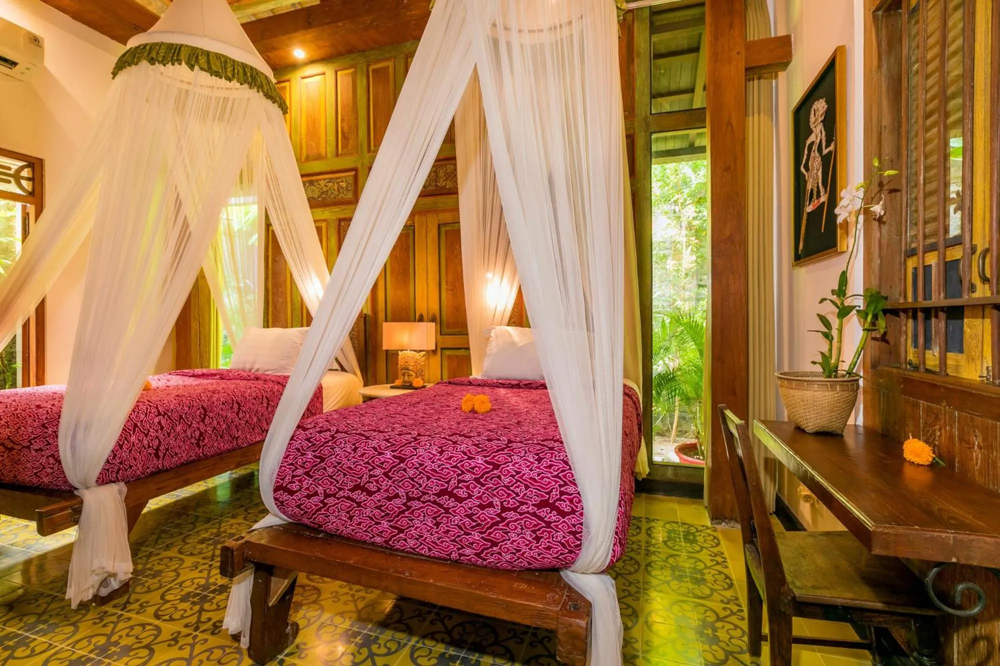 Bed in Villa Kampung Kecil Boutique Hotel