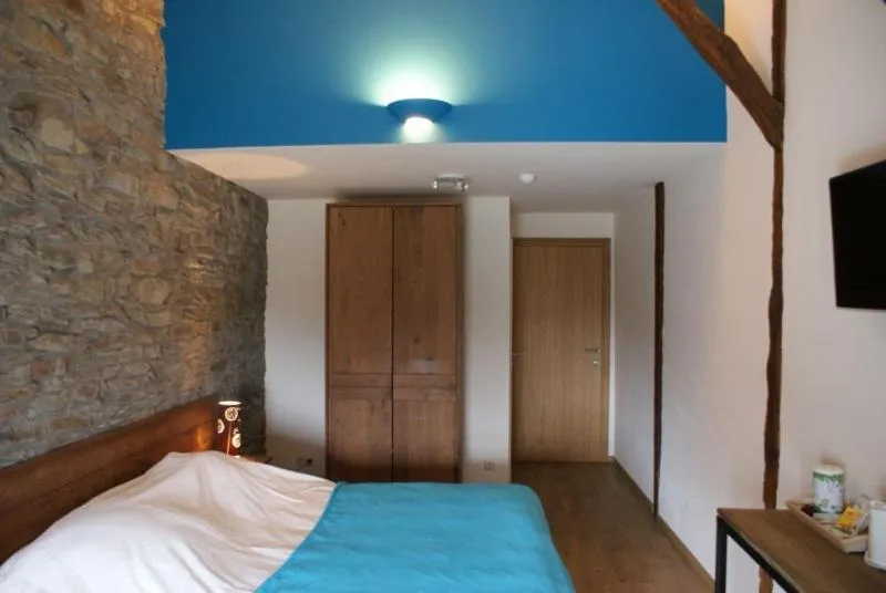 Photo of the whole room, Bed in Auberge Le Temps des Saveurs