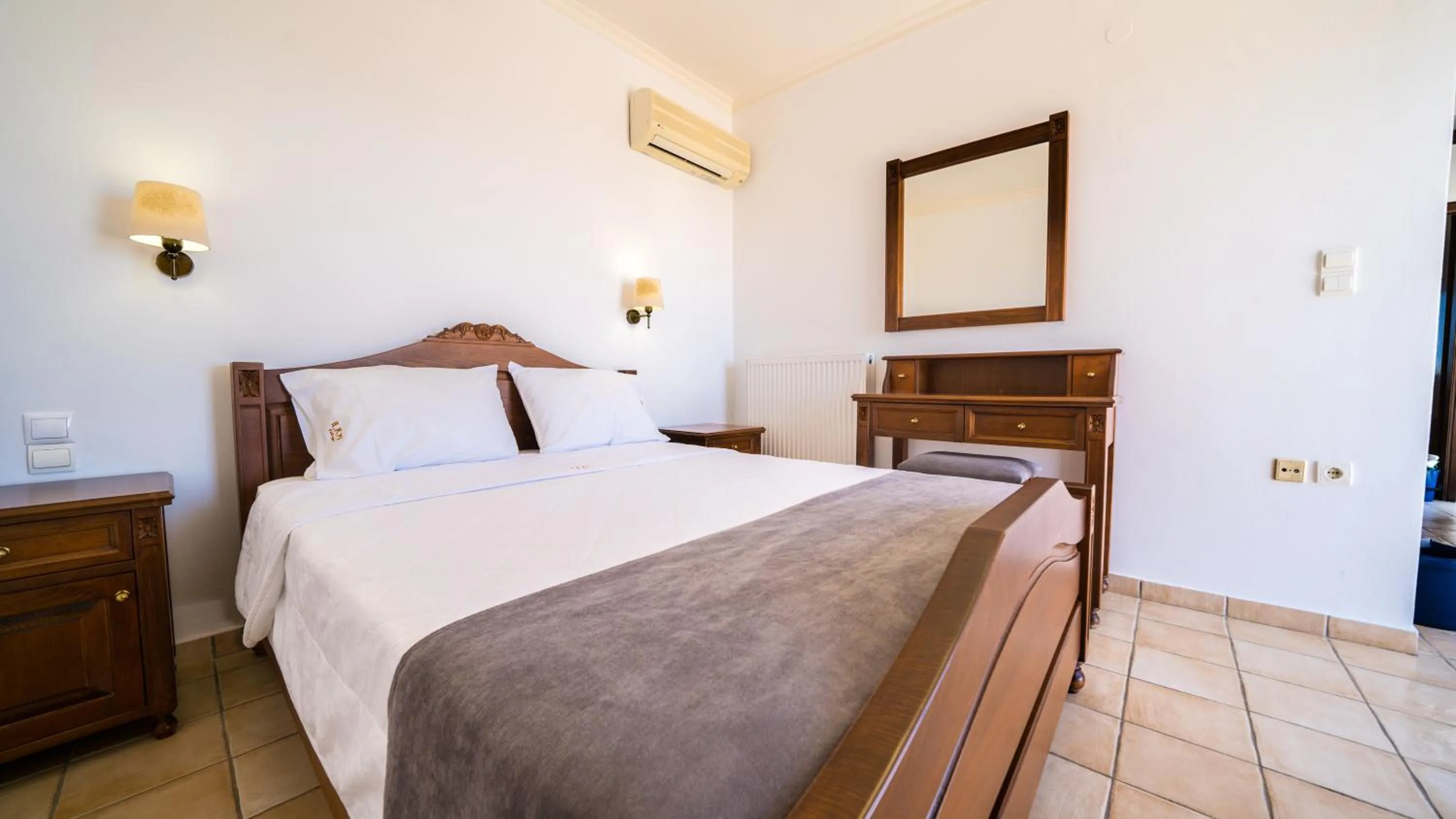 Bed in Ilios Village