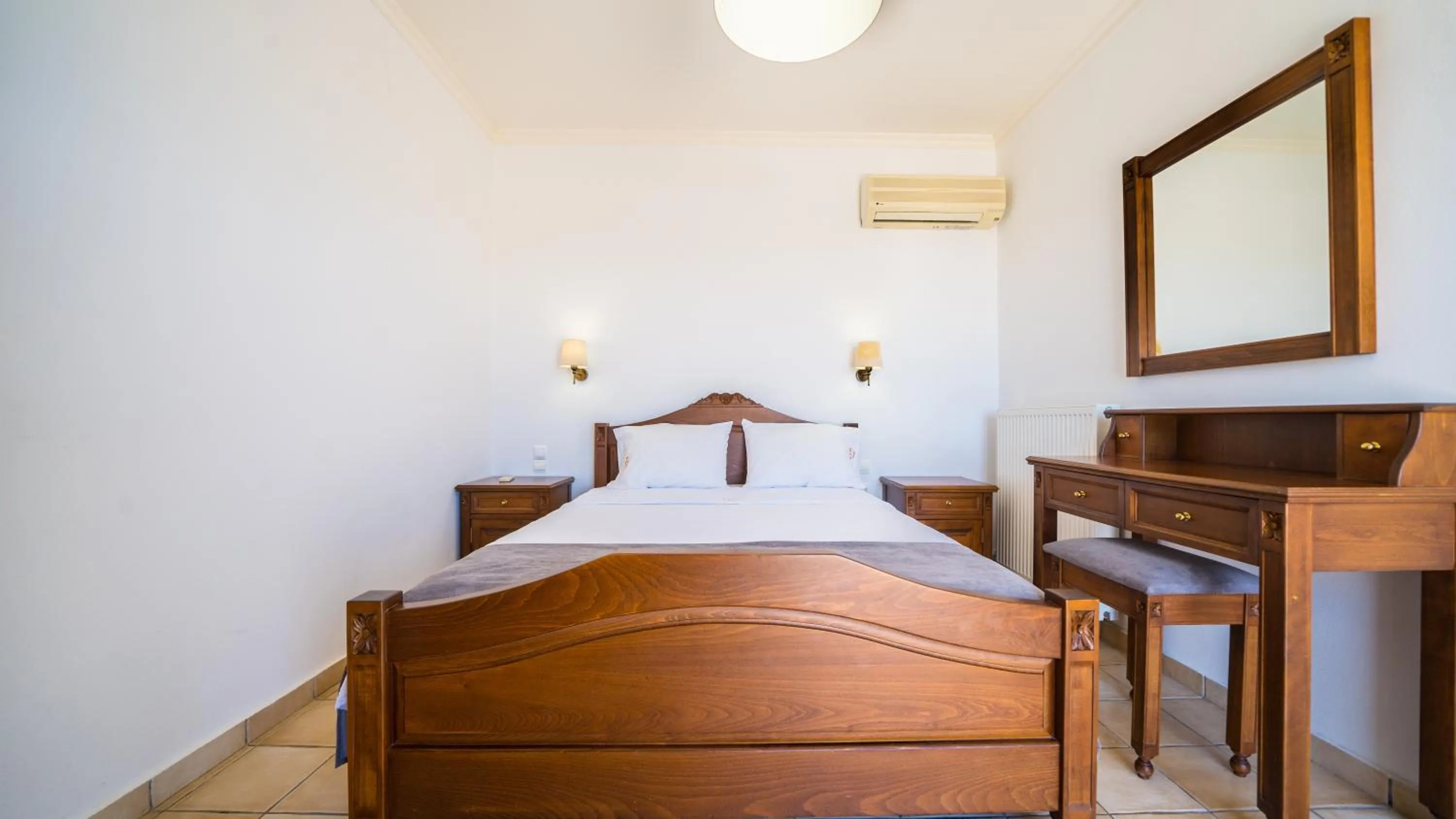 Bed in Ilios Village