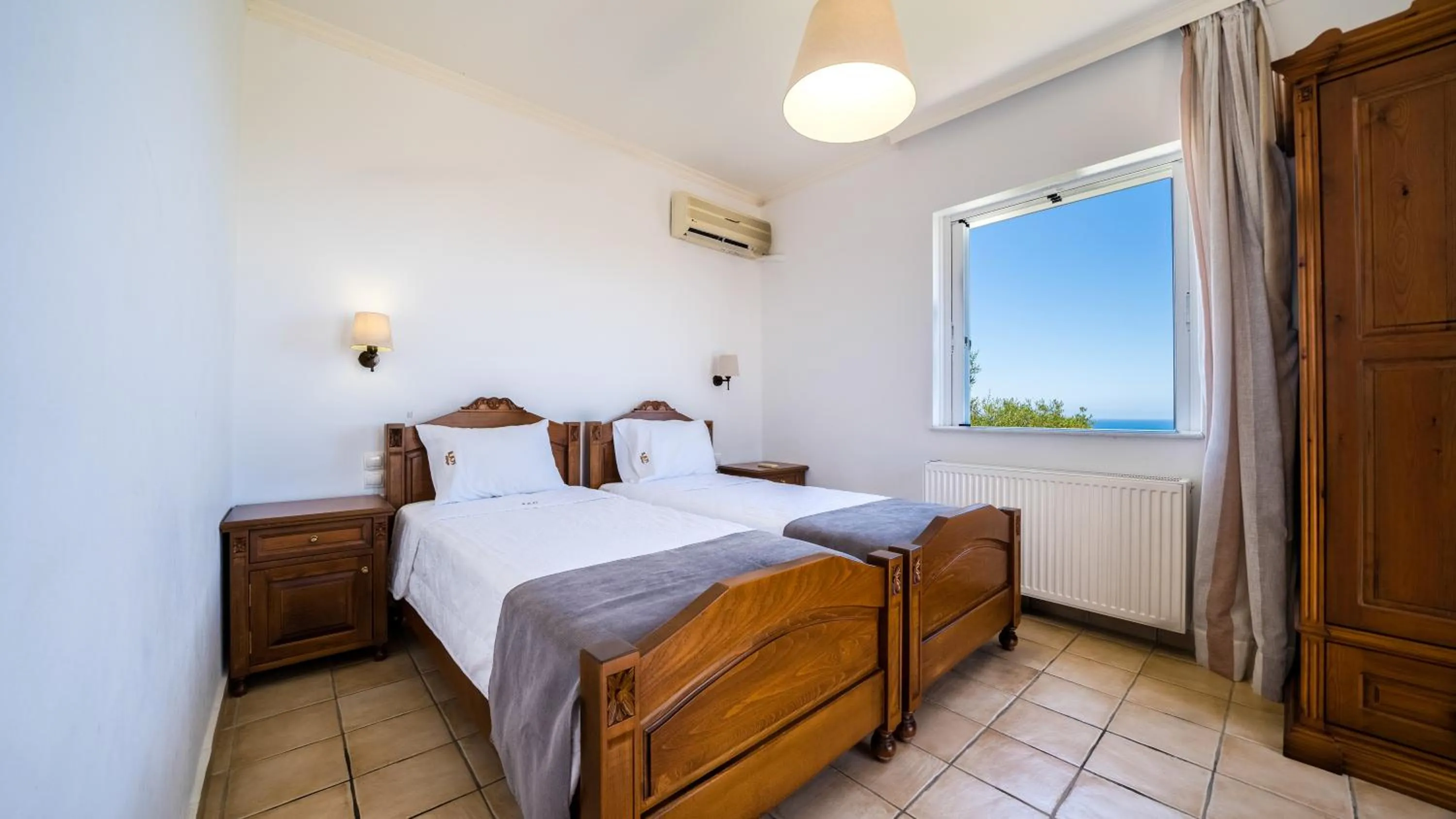 Bed in Ilios Village
