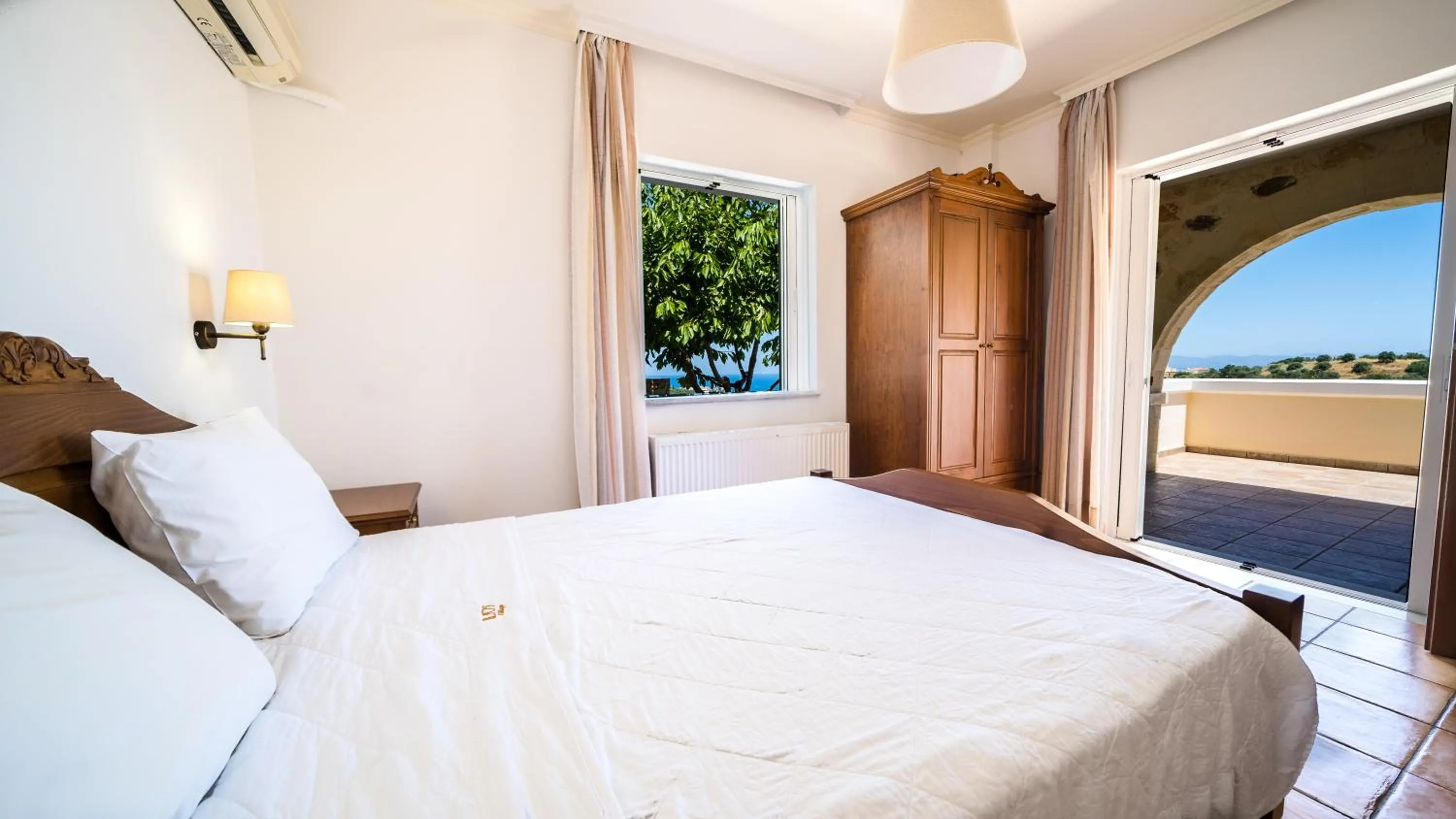 Bed in Ilios Village
