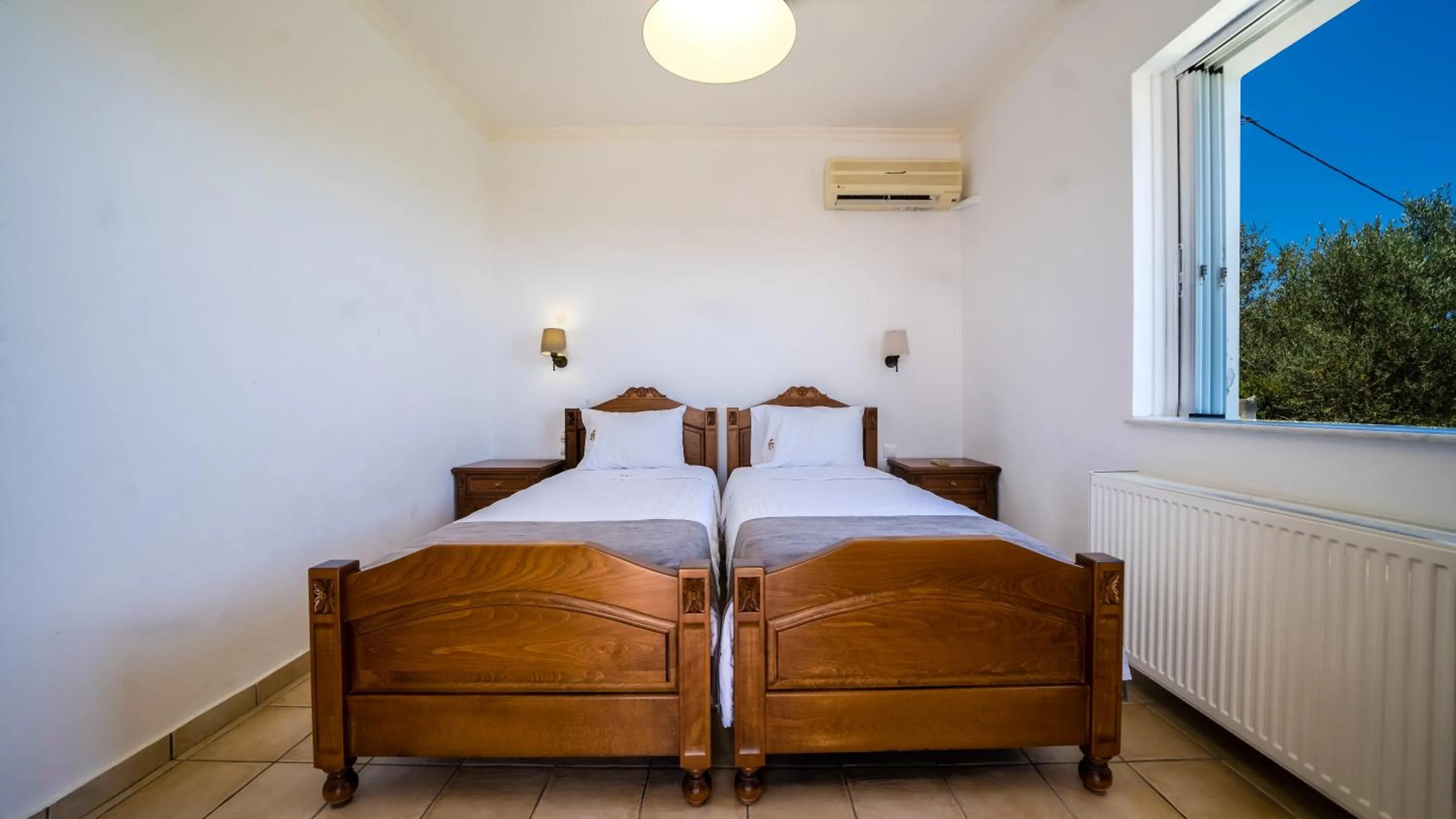 Bed in Ilios Village