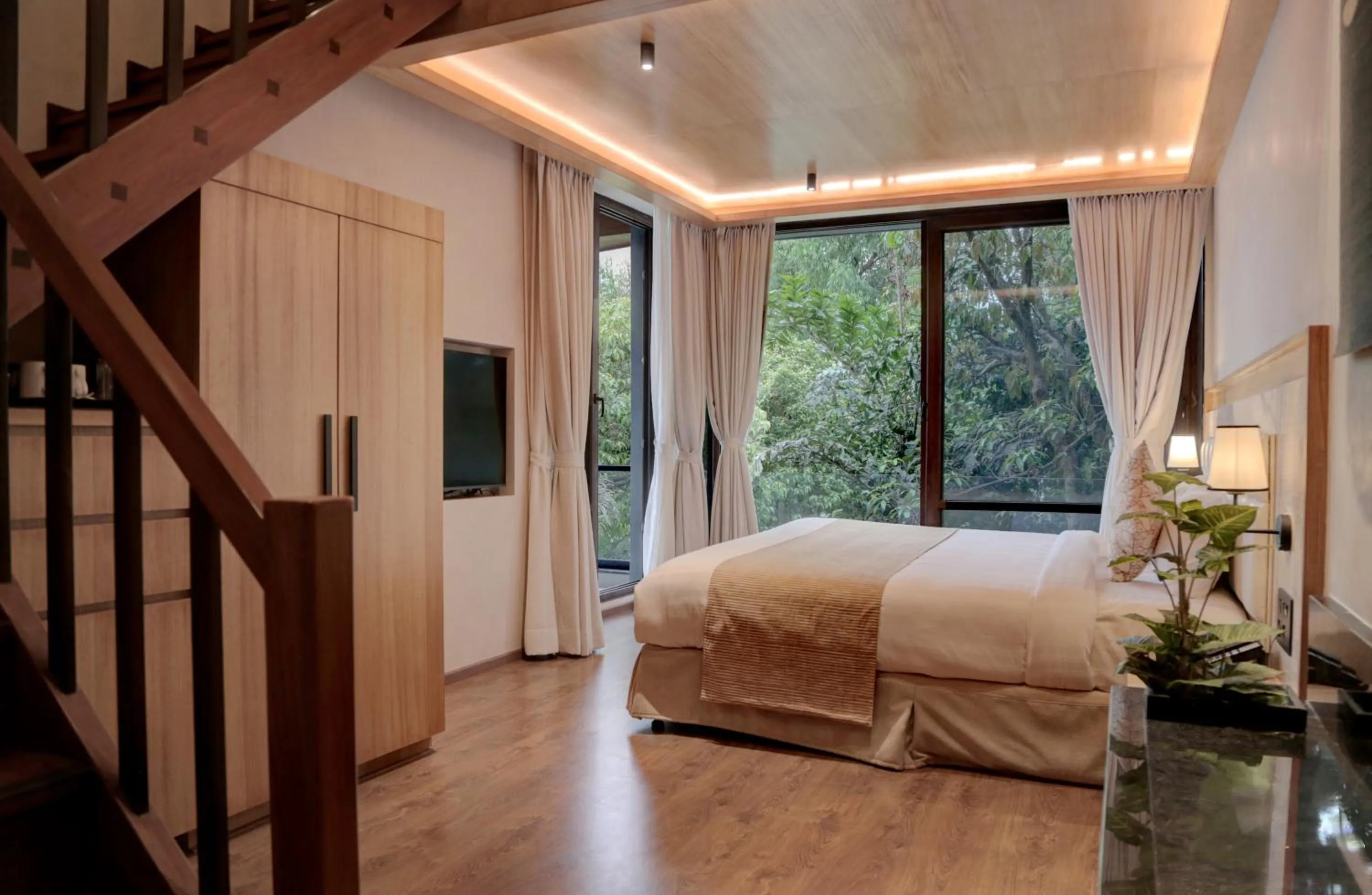 Bed in Brightland Resort & Spa