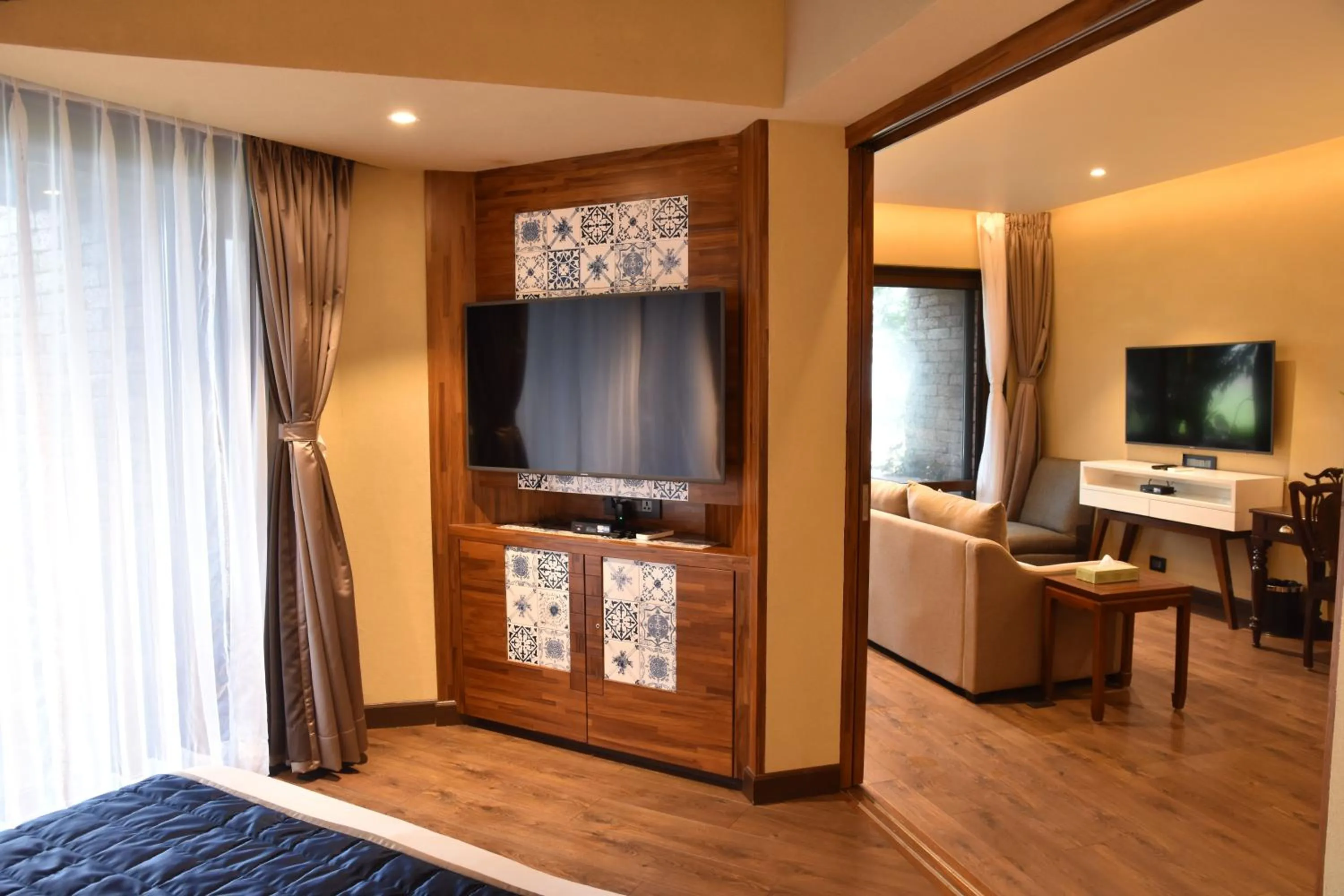 Living room, Bed in Brightland Resort & Spa