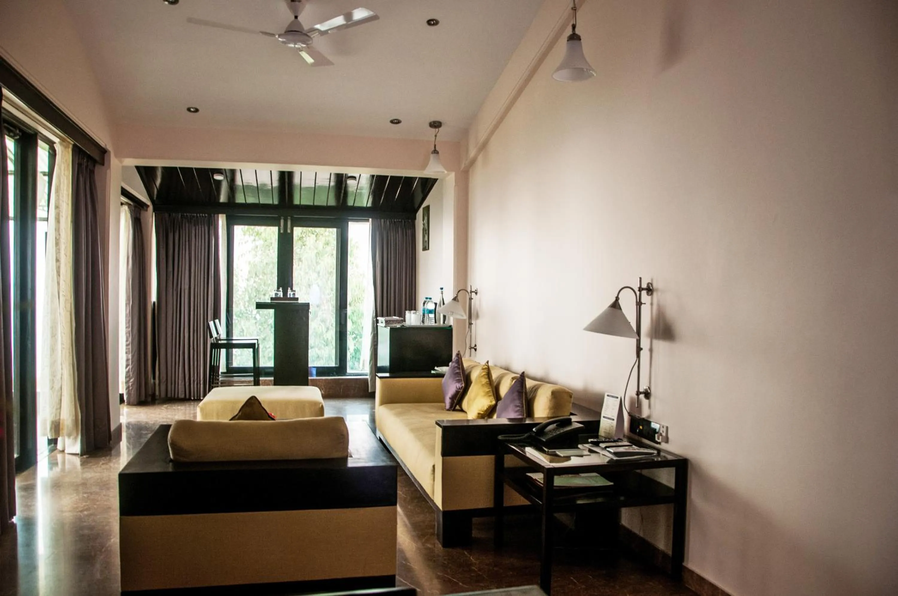 Living room, Bed in Brightland Resort & Spa