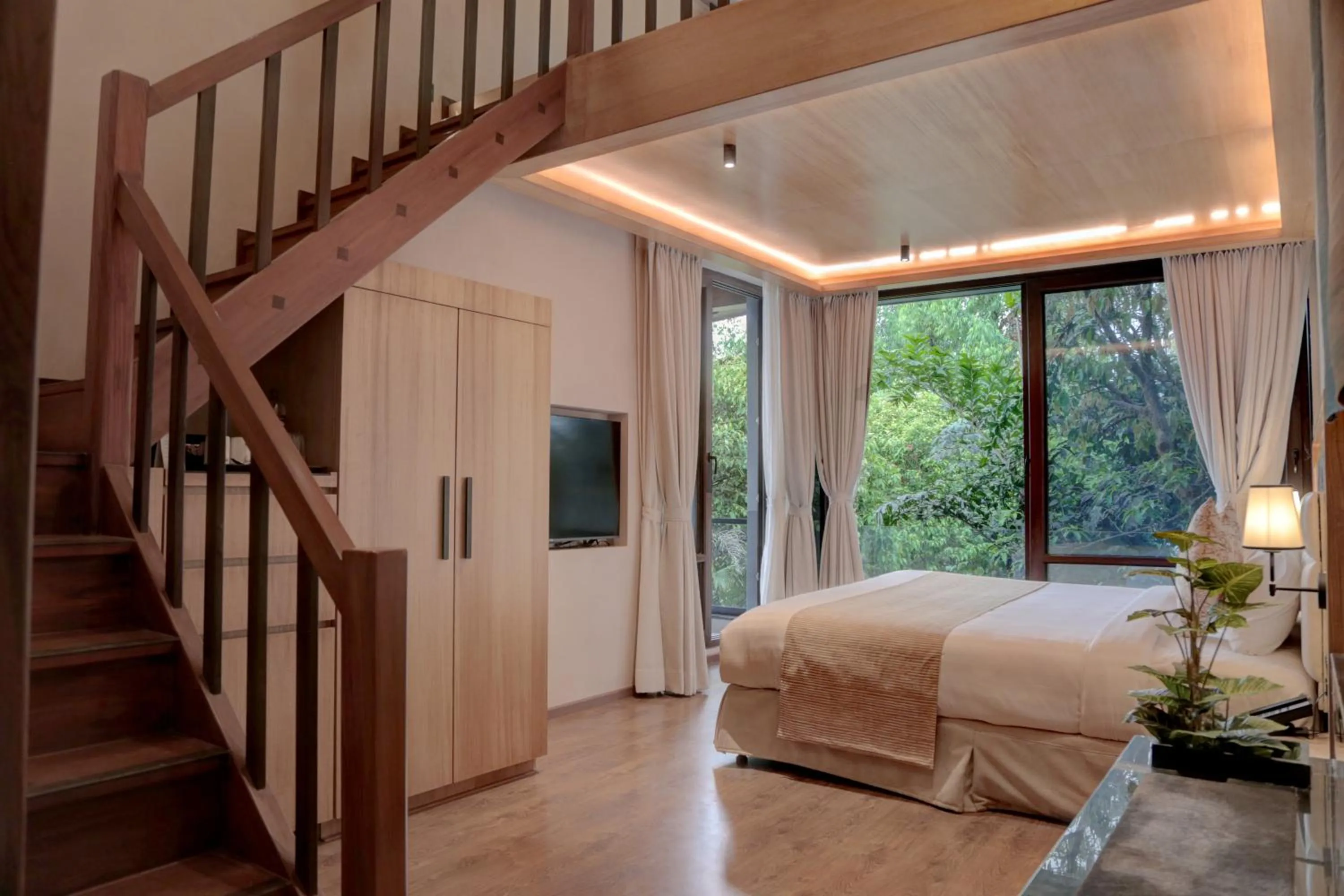 Bed in Brightland Resort & Spa