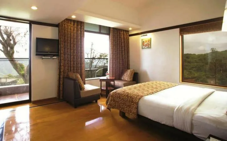Bed in Brightland Resort & Spa