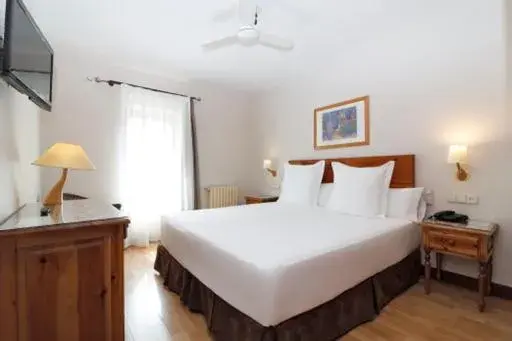 Bed in Hotel Vilagaros Bed in Hotel Vilagaros